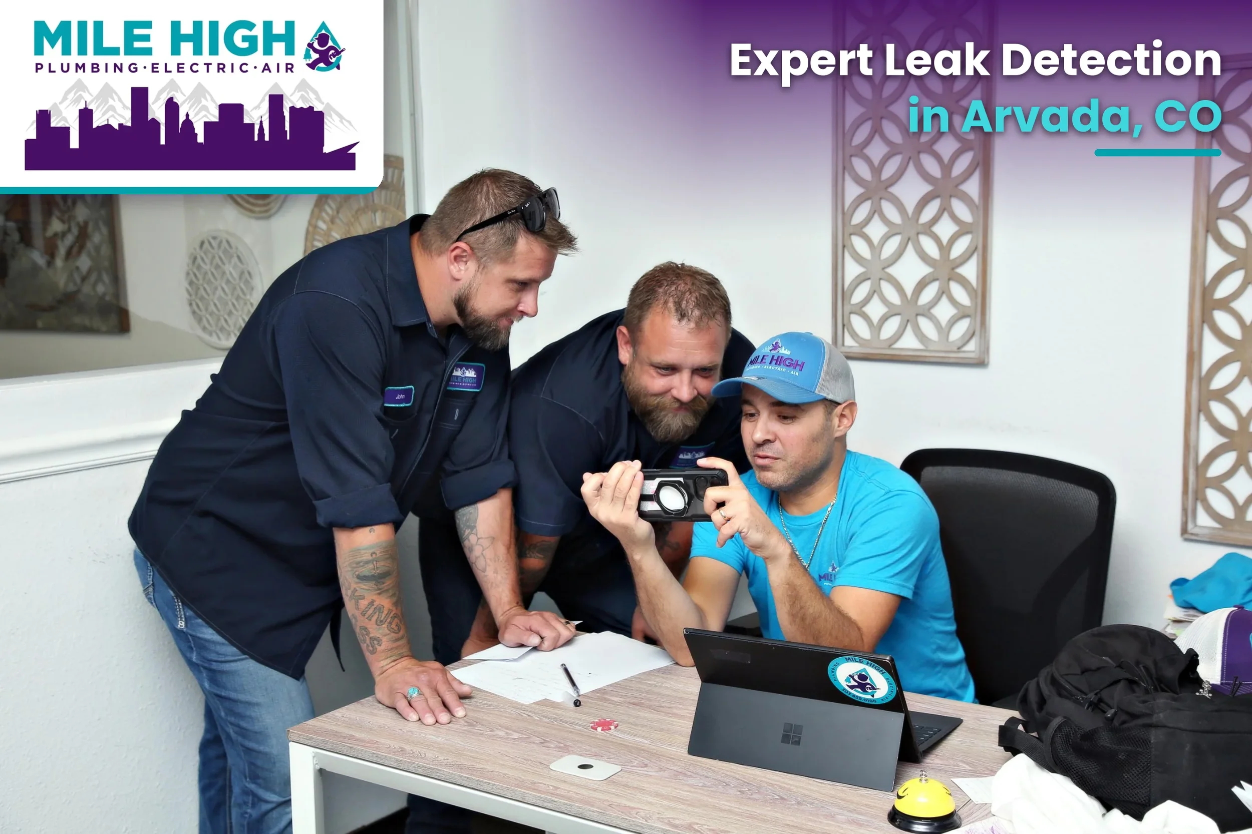 plumbers looking at a leak