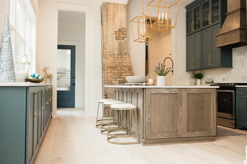 Transitional Kitchen With Contrasting Cabinetry And Exposed Brick Kitchen Remodel by The Cabinet Barn project photo
