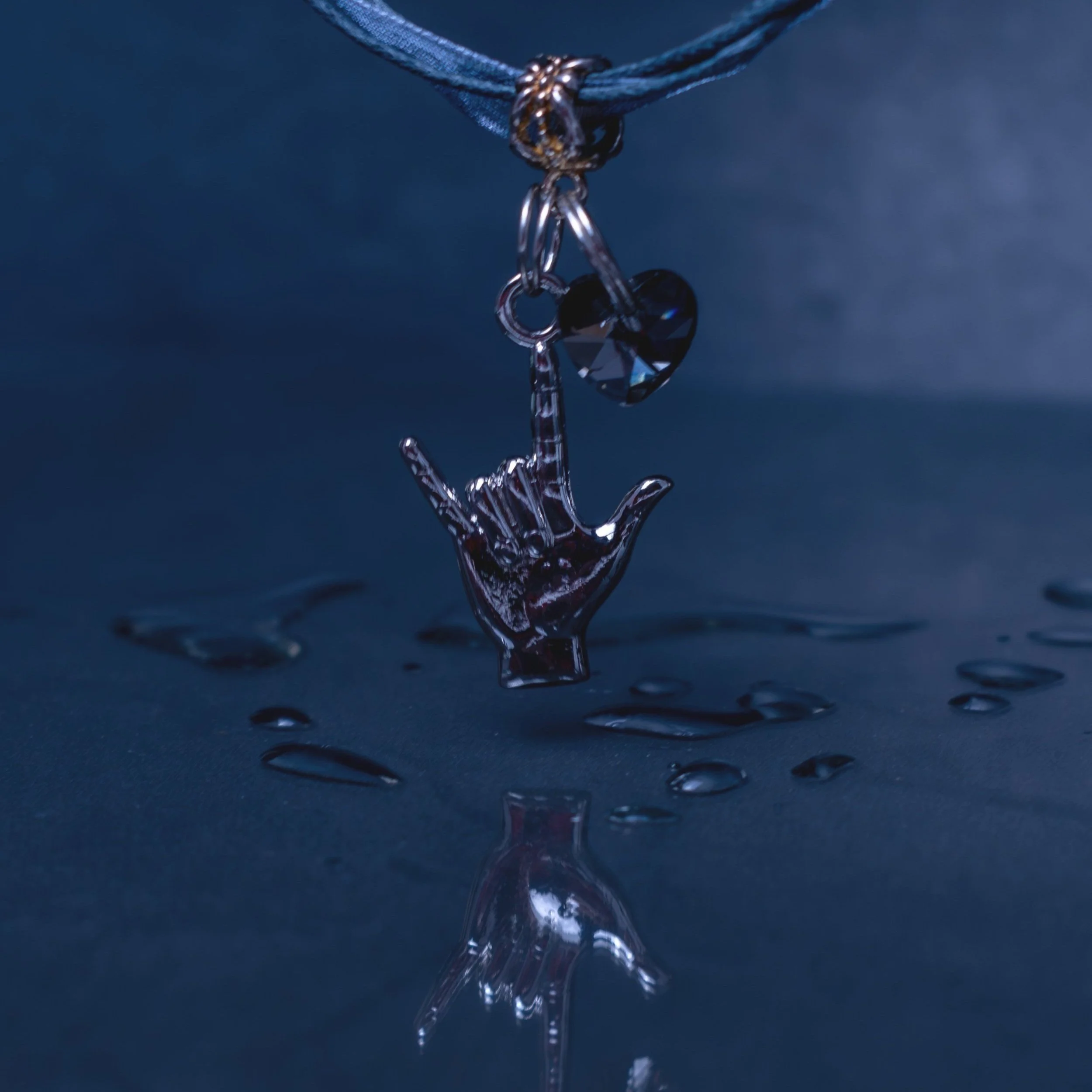 Grey necklace reflection.jpg