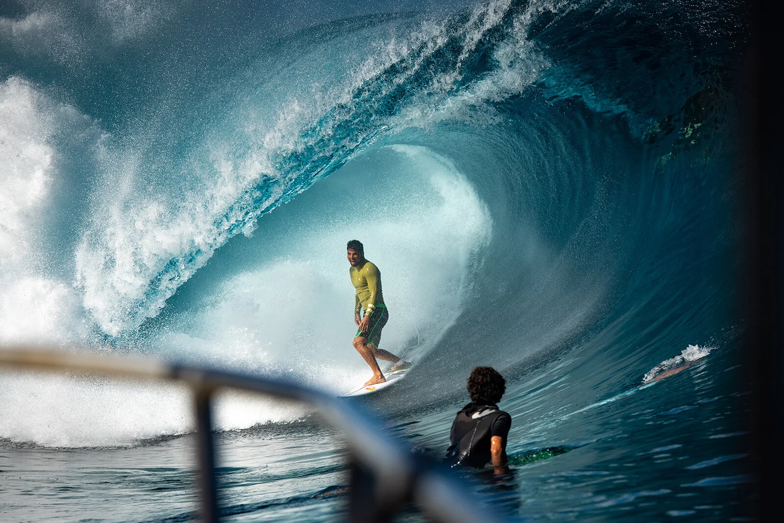 professional surfer michel bourez is in the barrel in a big wave in teahupoo in tahiti