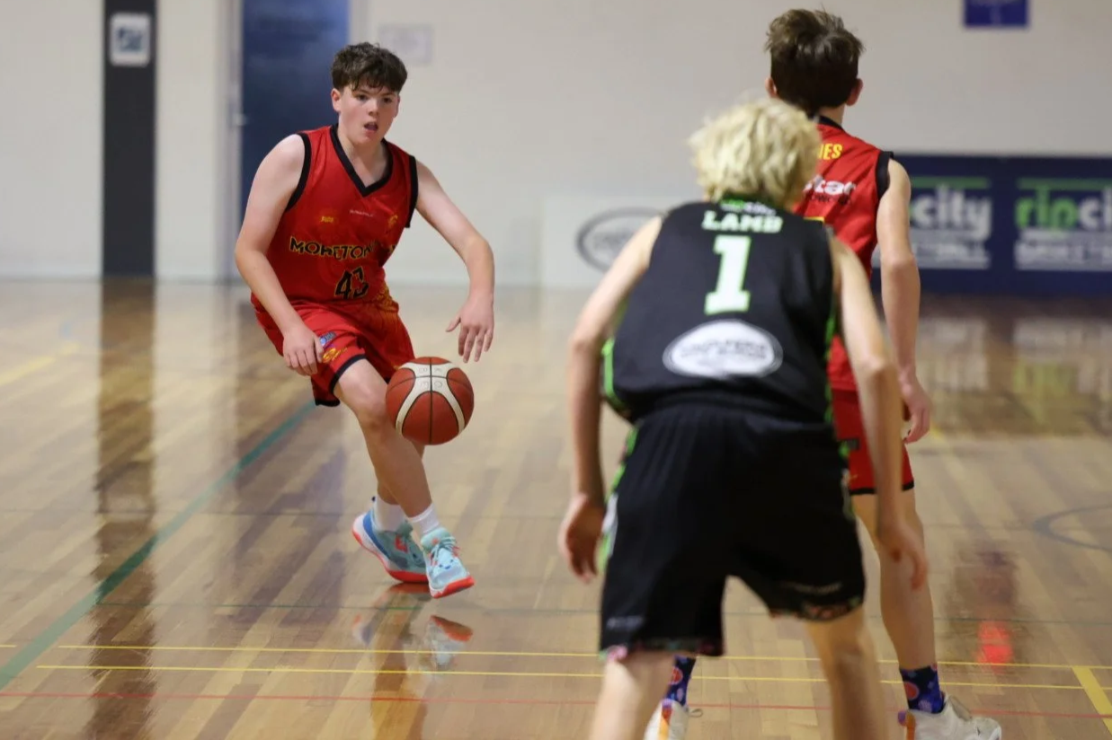 Young athlete completing a sports physiotherapy movement assessment