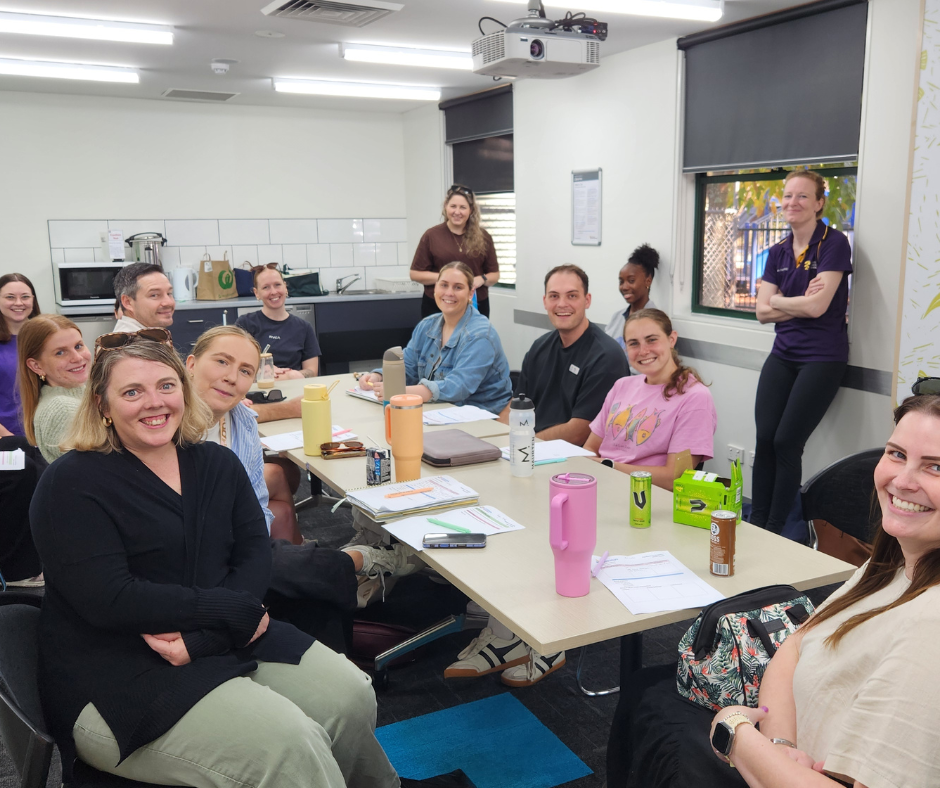GP and allied health professionals discussing child development planning