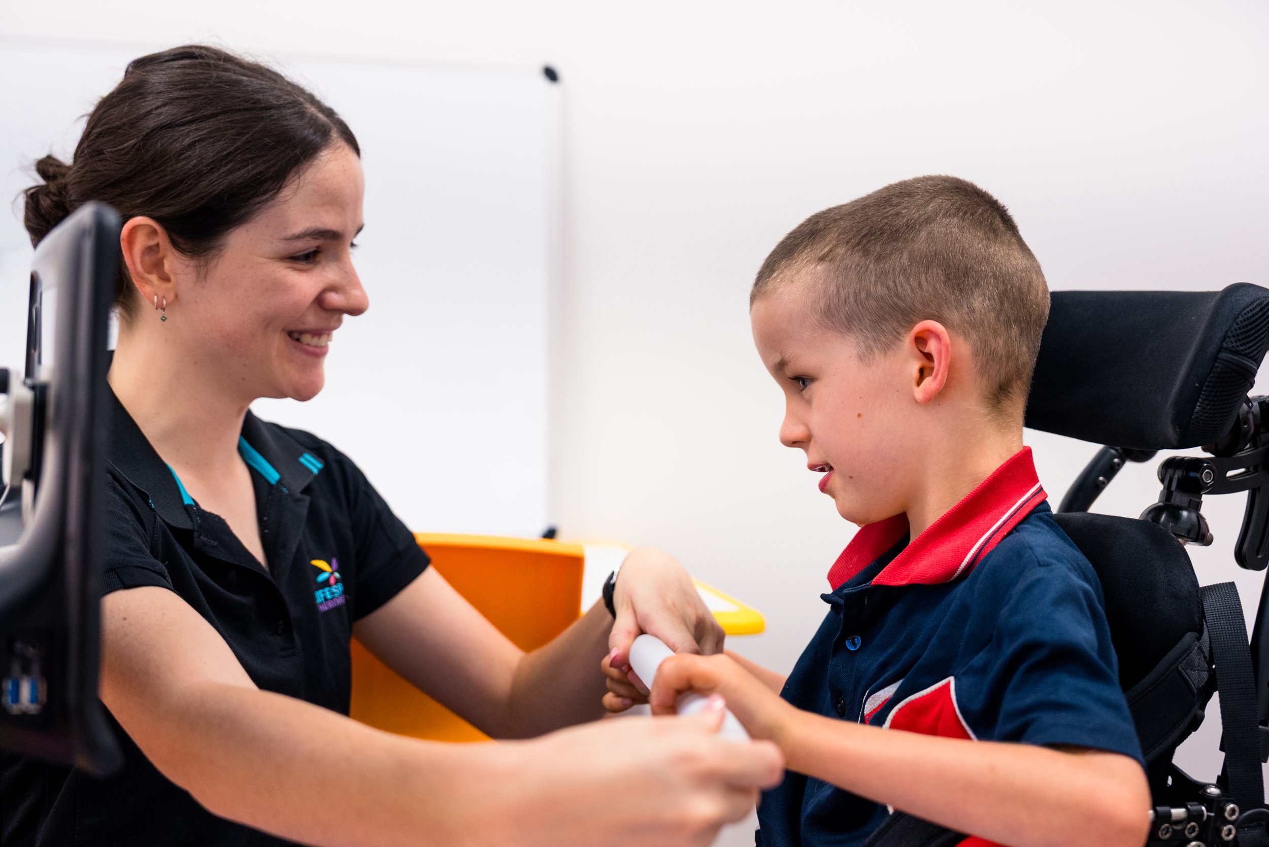 Paediatric occupational therapist supporting regulation and participation during everyday activities