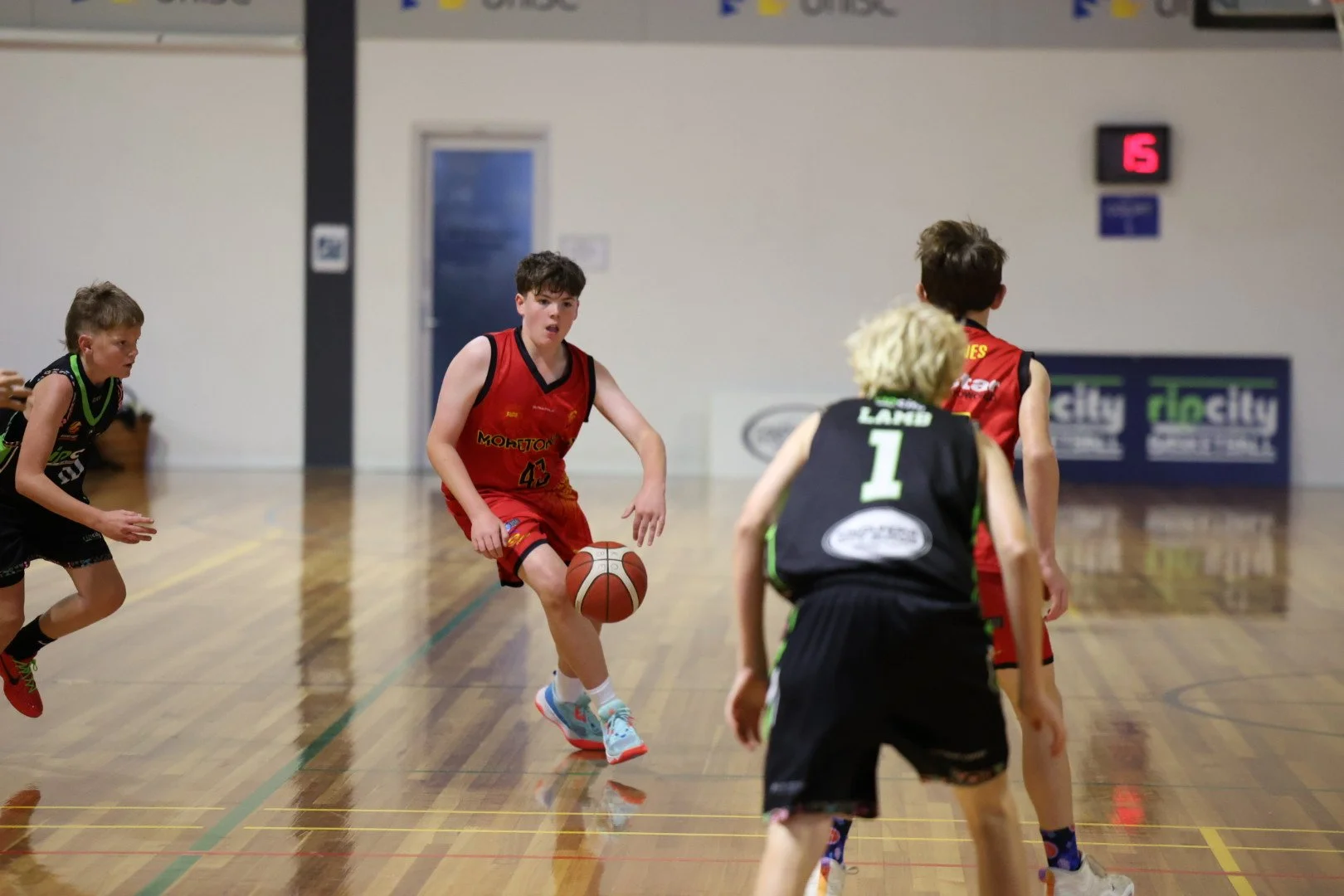 Coach and physiotherapist collaborating on safe participation strategies