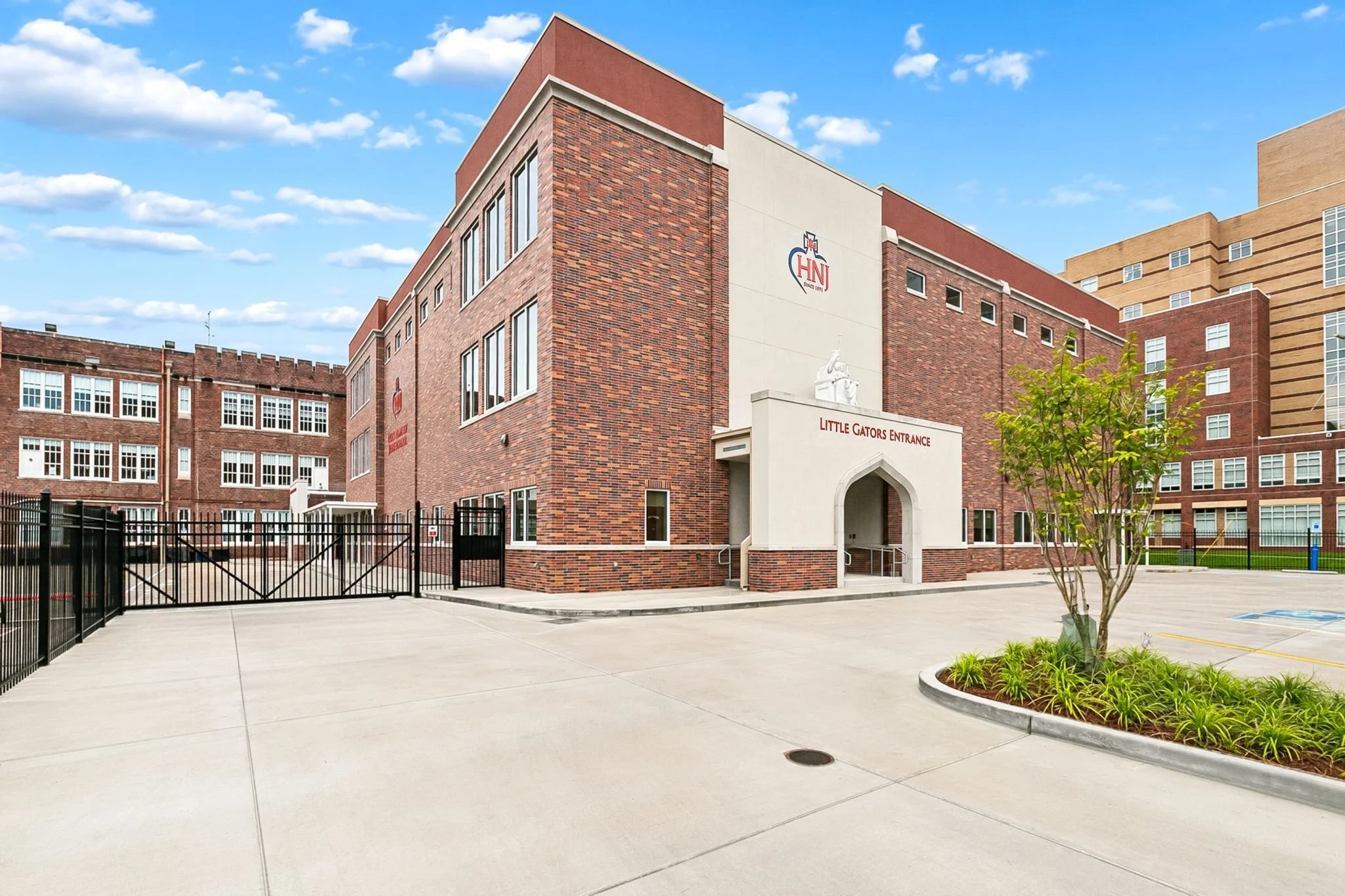 Holy Name of Jesus School, brick veneer and architectural cast stone entrance