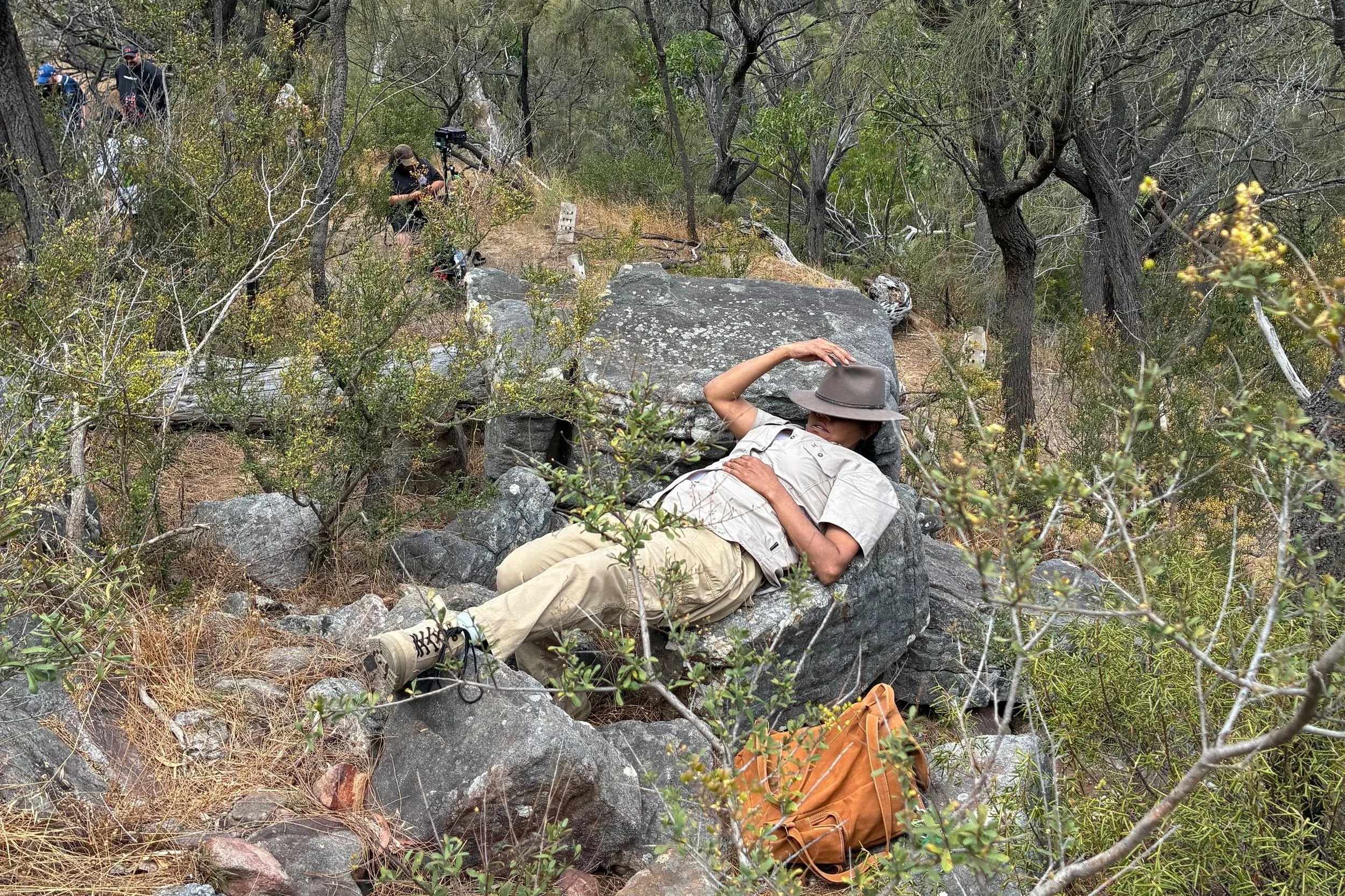 On location, Natasha Wanganeen relaxes in the bush for a moment between takes