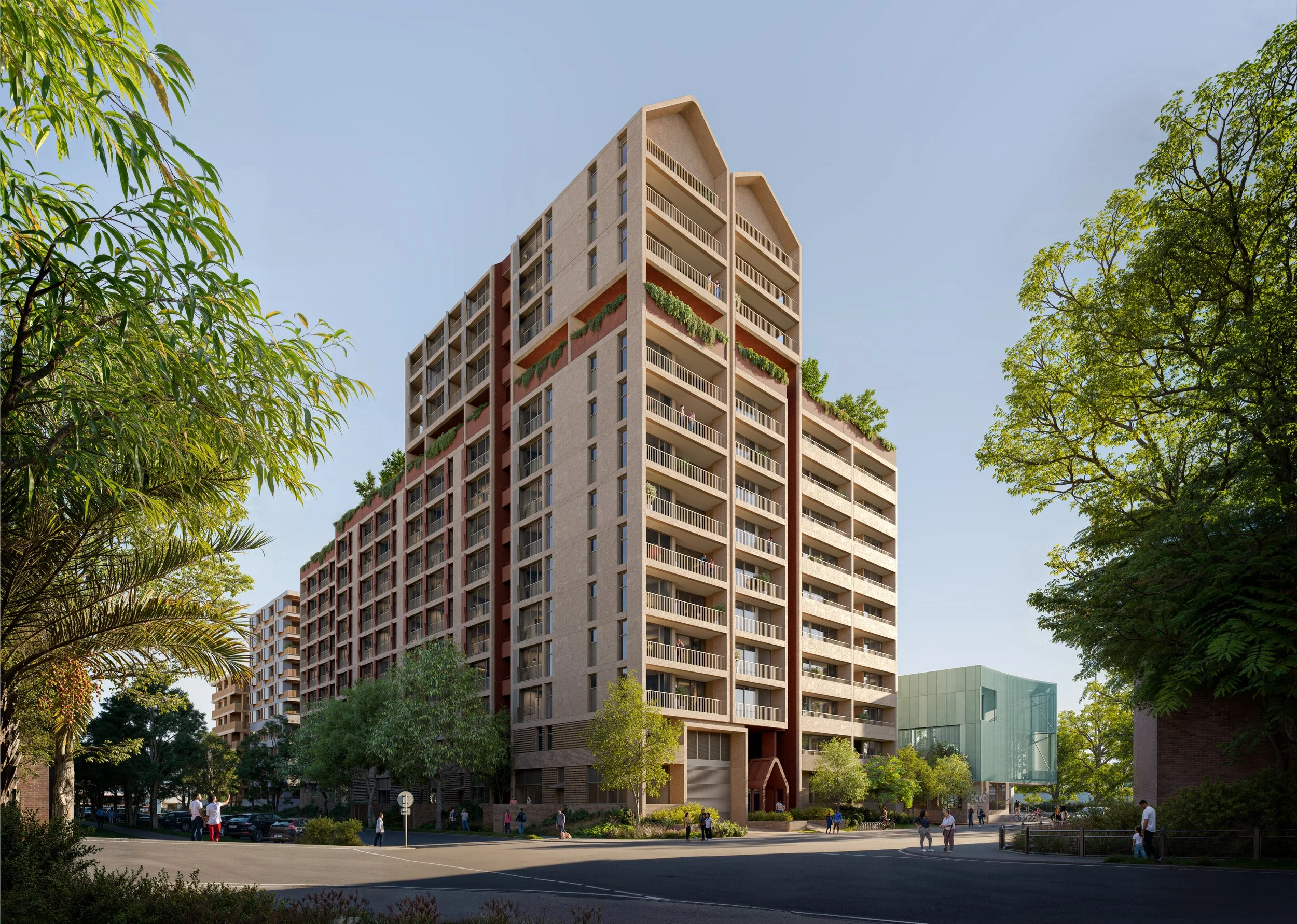 A tall modern apartment building with greenery on balconies and rooftop, surrounded by trees and people walking in a cityscape with a clear blue sky.
