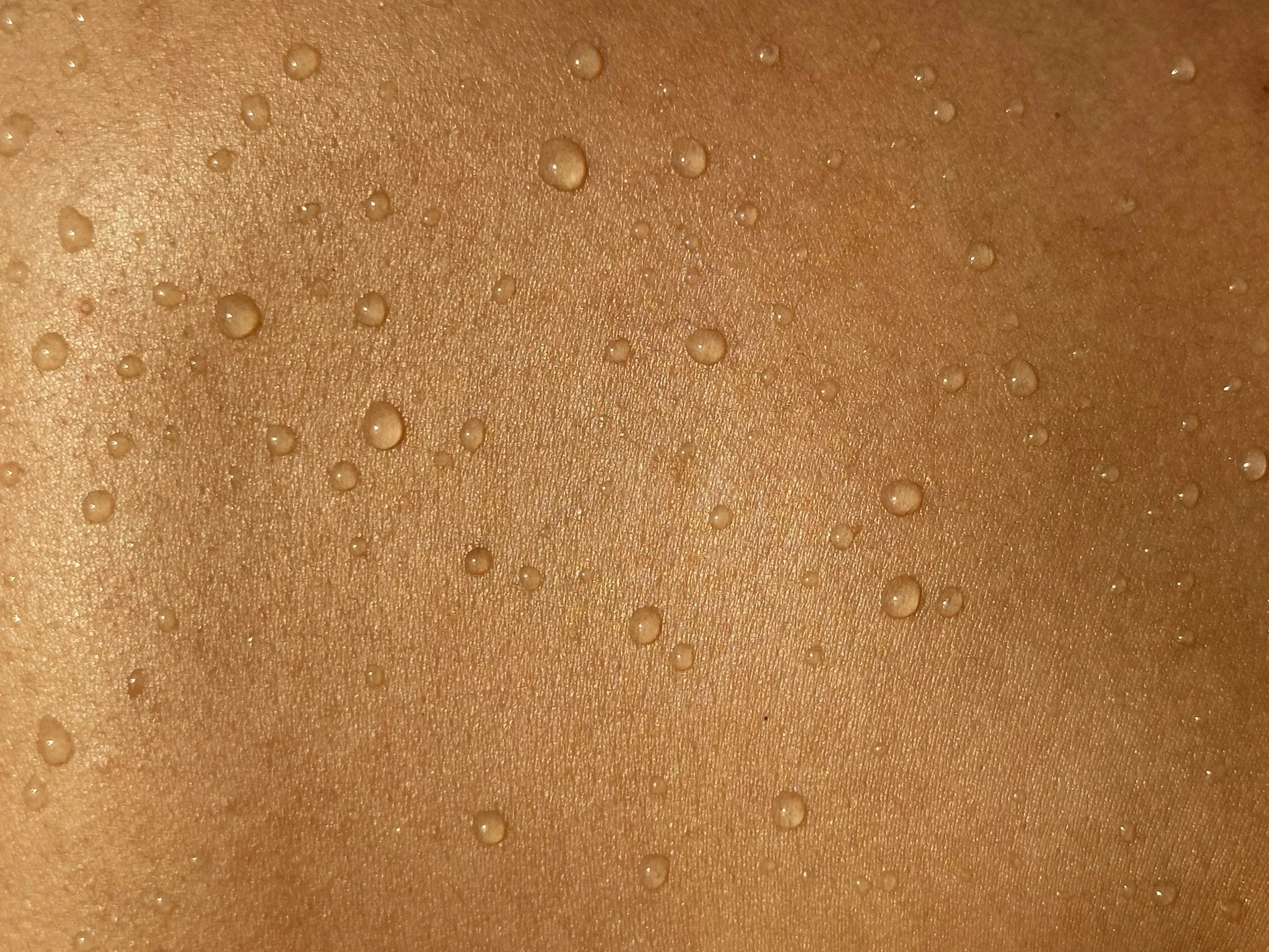 Close up of healthy skin with beads of water on the surface