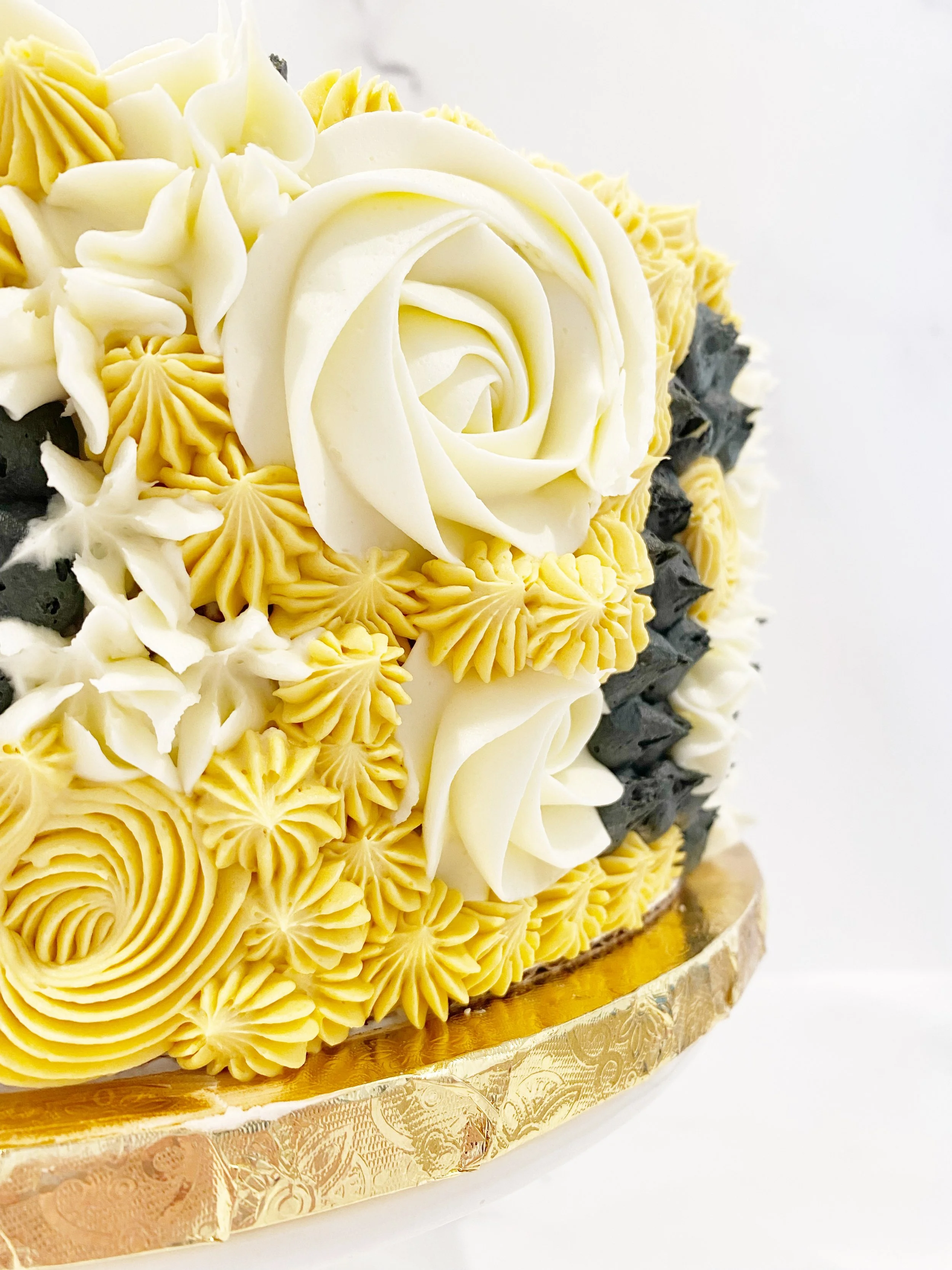 gold and white cake.JPEG