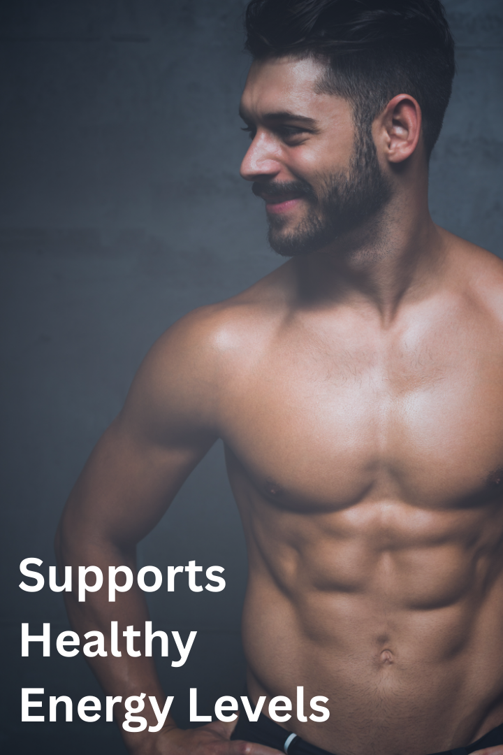 A shirtless man with a beard and styled hair smiling and looking to his right, showing his muscular chest and abdomen, against a gray background. Text overlay reads "Supports Healthy Energy Levels."