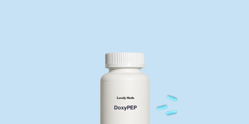 A white pill bottle labeled 'DoxyPEP' with a few blue capsules beside it against a light blue background.
