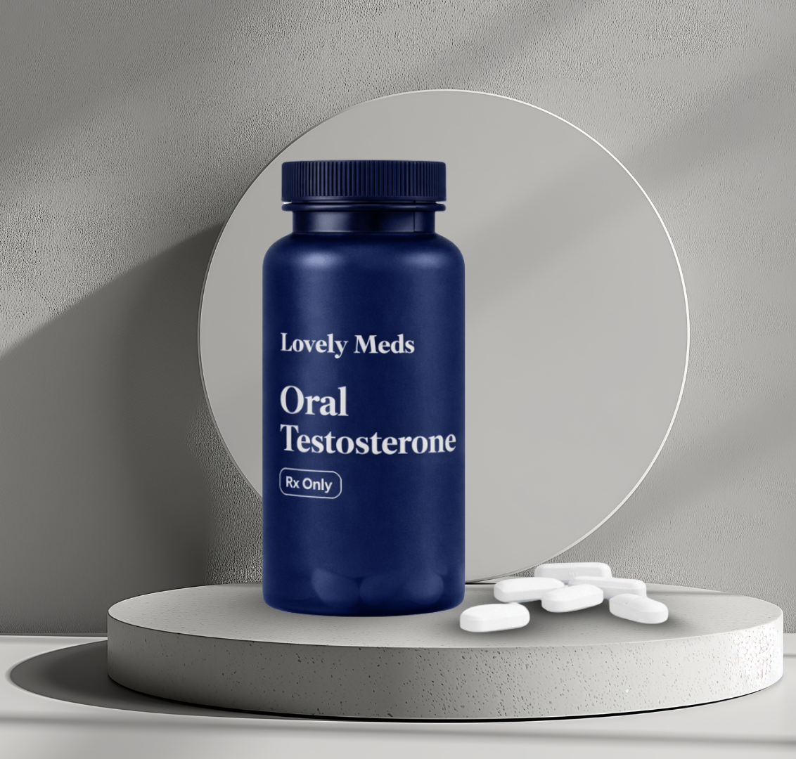 A blue bottle labeled "Lovely Meds Oral Testosterone Rx Only" placed on a white platform with several white pills beside it, with a round mirror behind and a neutral background.