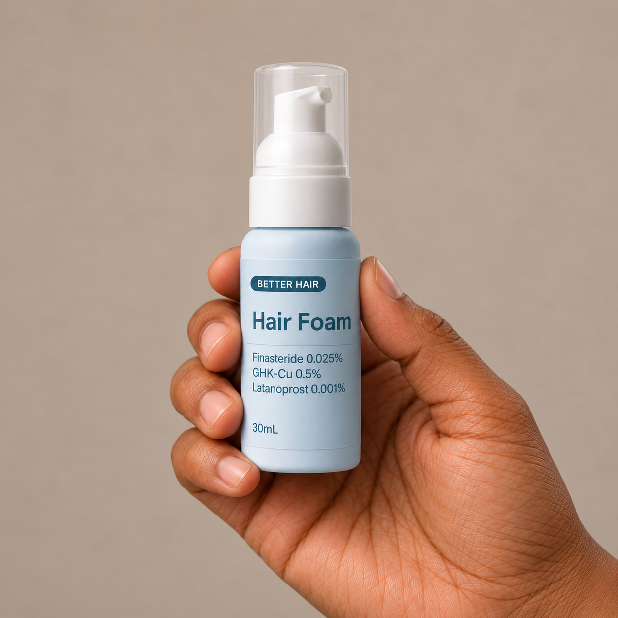 3-in-1 Hair Foam bottle held in hand