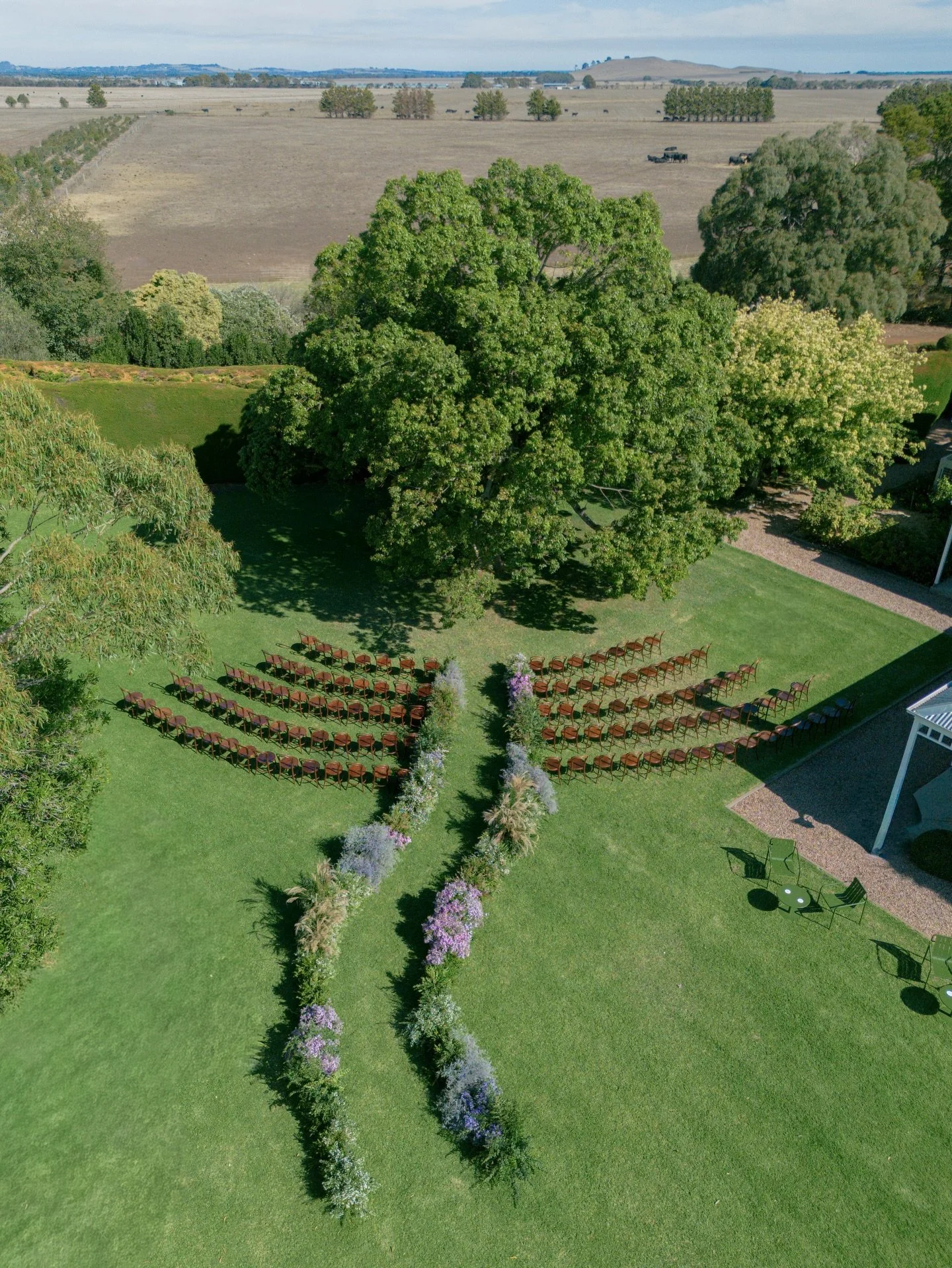 I&amp;L &mdash; The couple wed under a sentimental tree at the brides parents home. We made the tree the feature by creating a winding organic garden bed aisle leading to the tree. 

Planning, Styling &amp; Coordination&nbsp;@thenuptialcollective
Pho