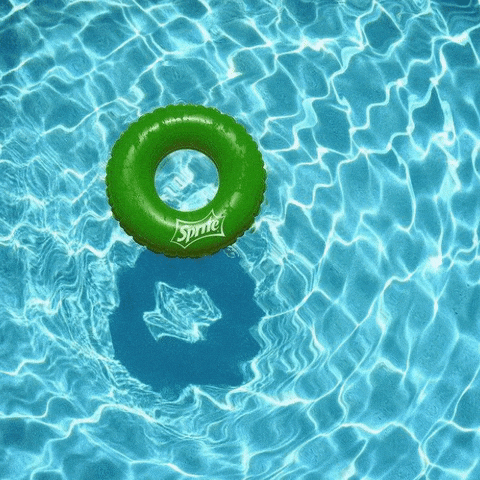 green pool float in a summer pool