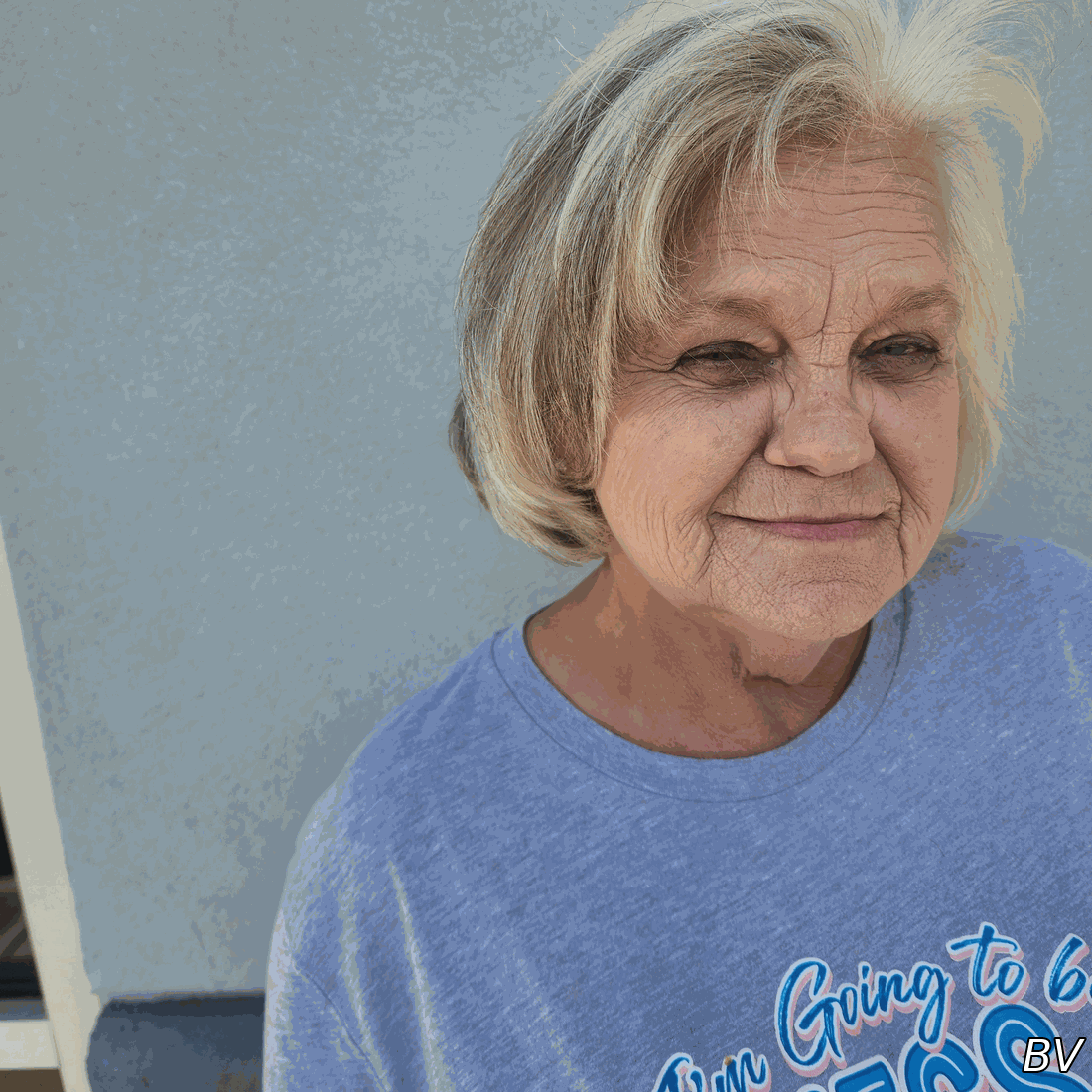 This is my mom! Forgot to snap a before, but her hair was past her shoulders. This is her natural color. It was a breezy day, so the hair is also naturally windblown.
