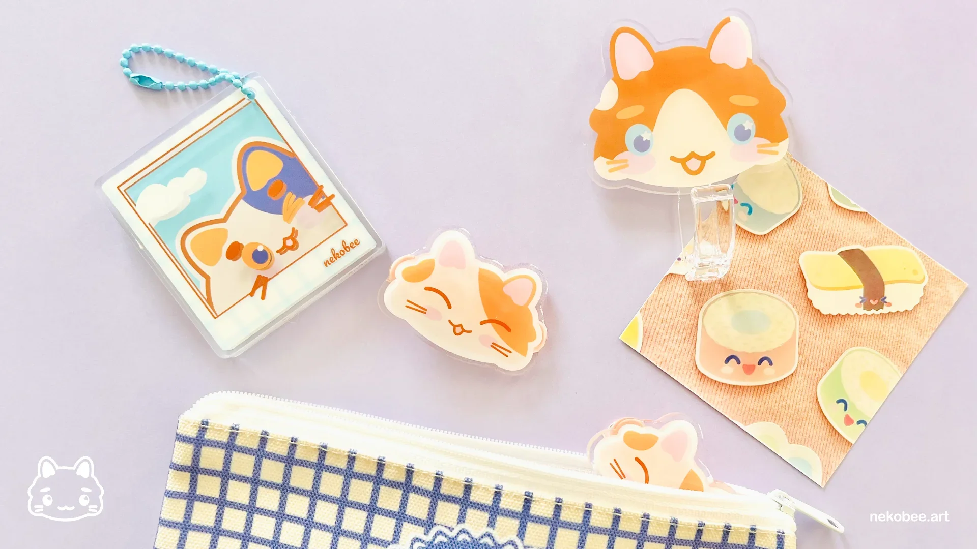 cute cat themed hair clips and keychains by Nekobee