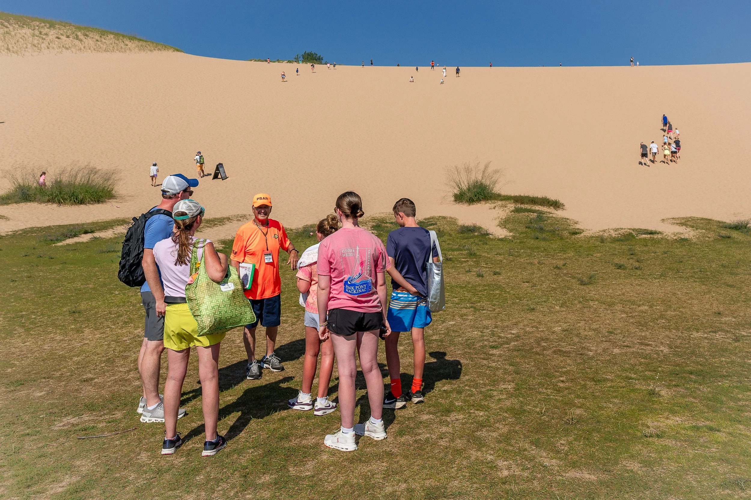 PSAR Volunteer educating visitors at the base of the Dune Climb