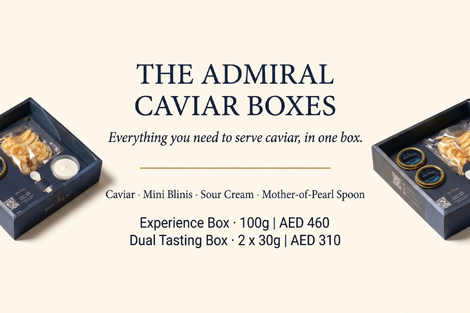 Advertising image for The Admiral Caviar Boxes, featuring two boxes of caviar with accompanying mini blinis, sour cream, and mother-of-pearl spoon. Price details for Experience Box and Dual Tasting Box in AED.