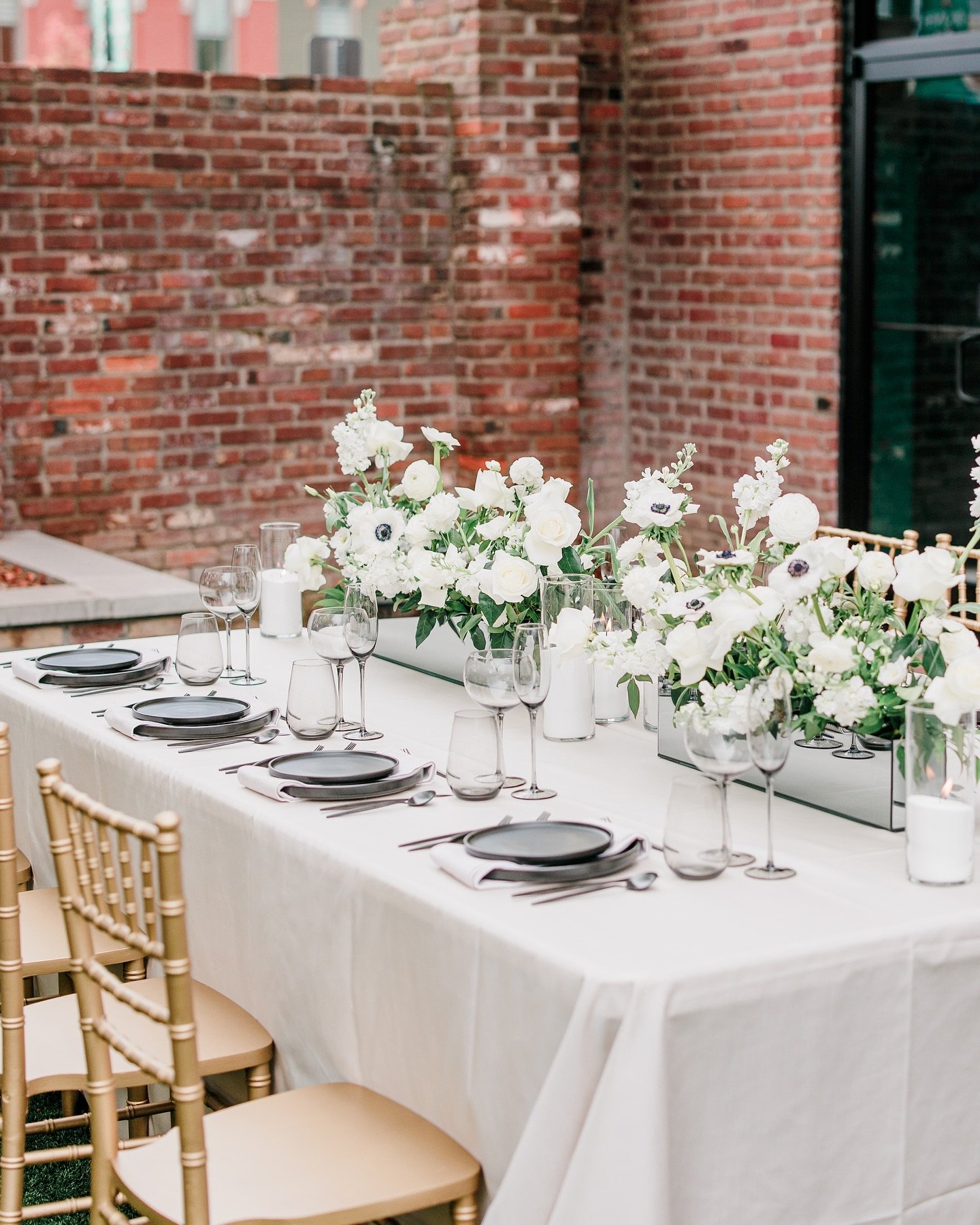 Elegant wedding venue with table setting.