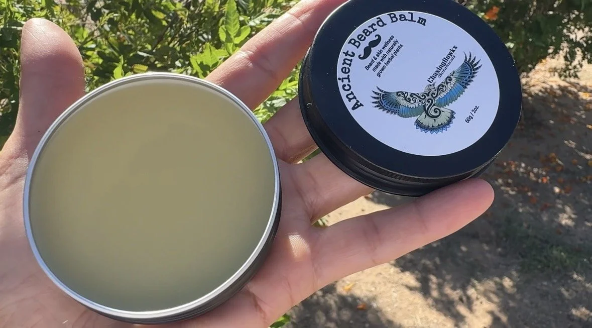 Ancient Beard Balm holding it website.jpg