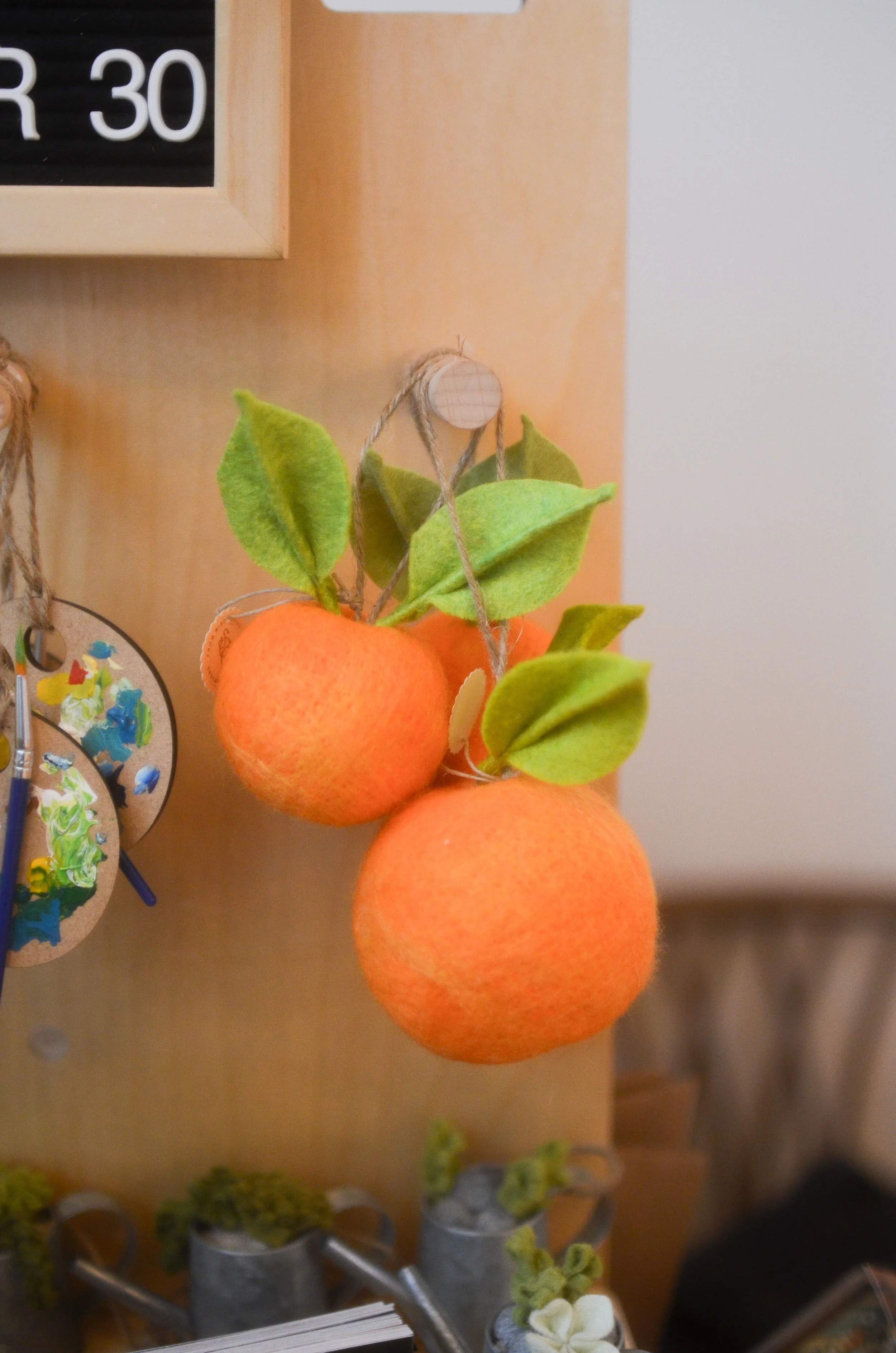 Needle felted oranges.