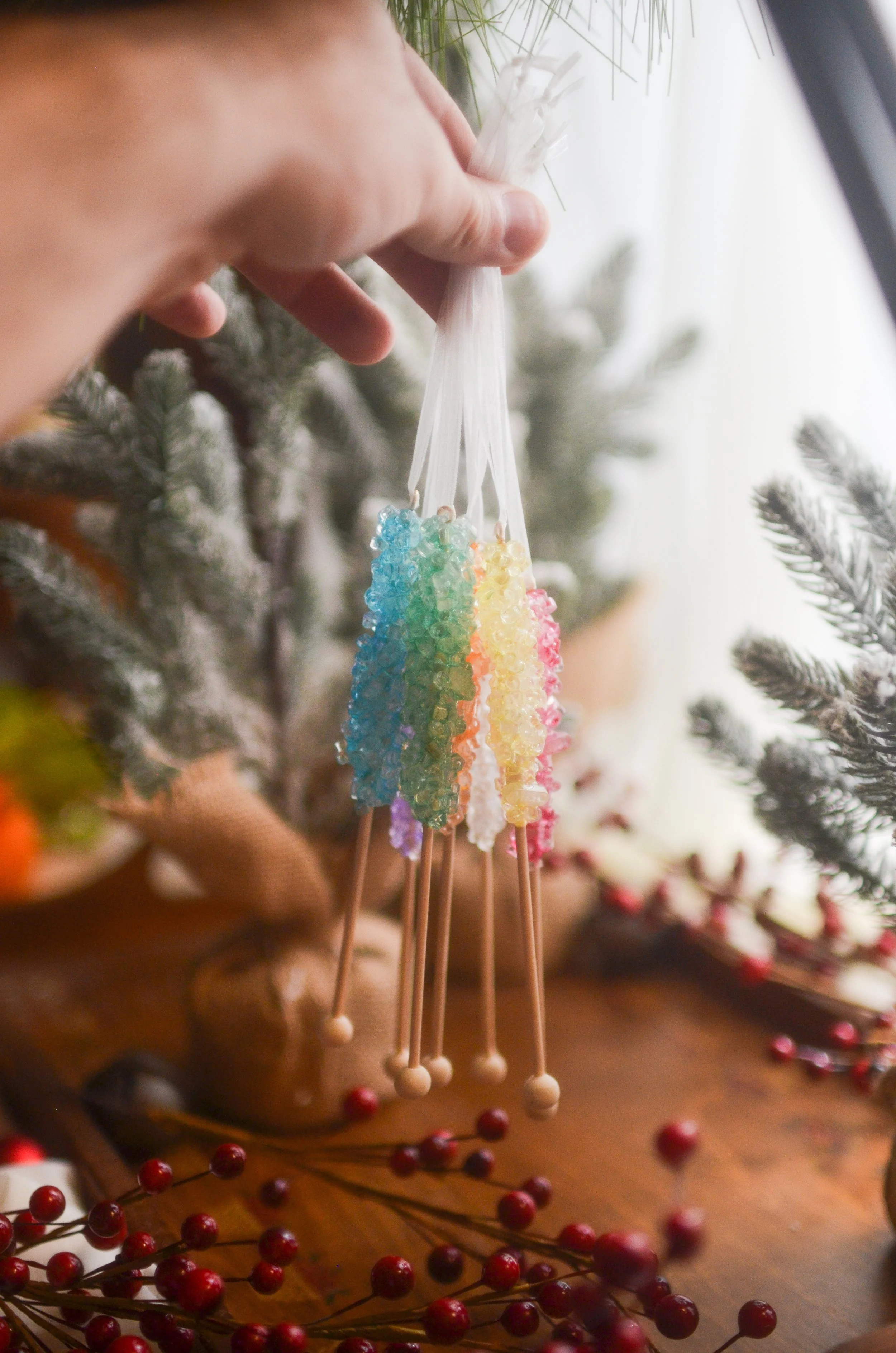 Handcrafted resin rock candy ornaments- and yes, there are little laser cut acrylic logos on each one!