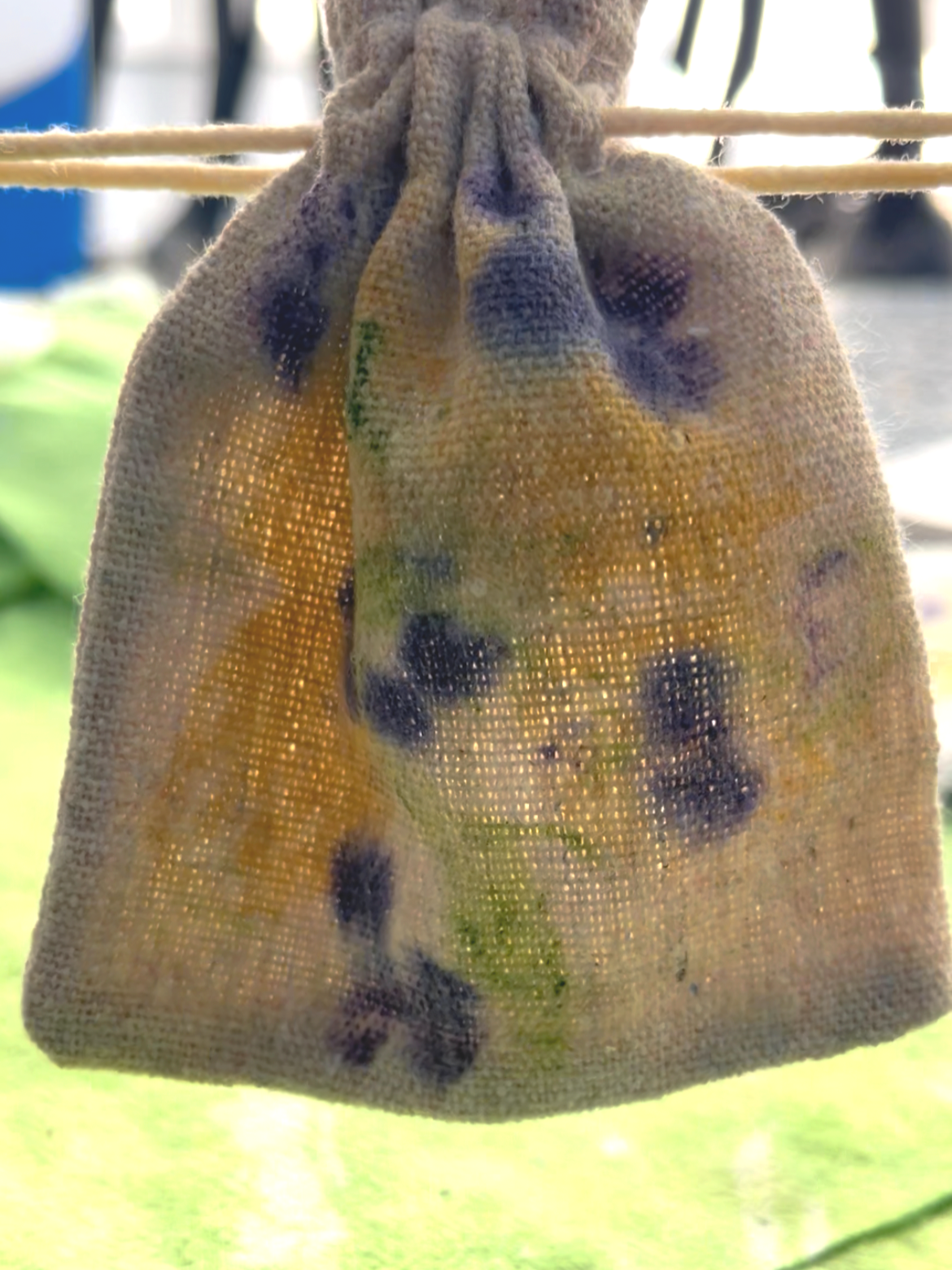 botanical print natural tan bag drawstring pulled