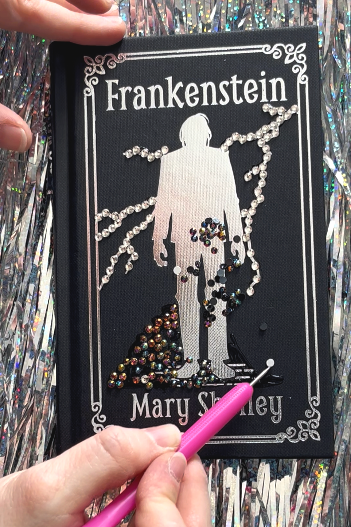 frankenstein book black with silver and gemstones on cover