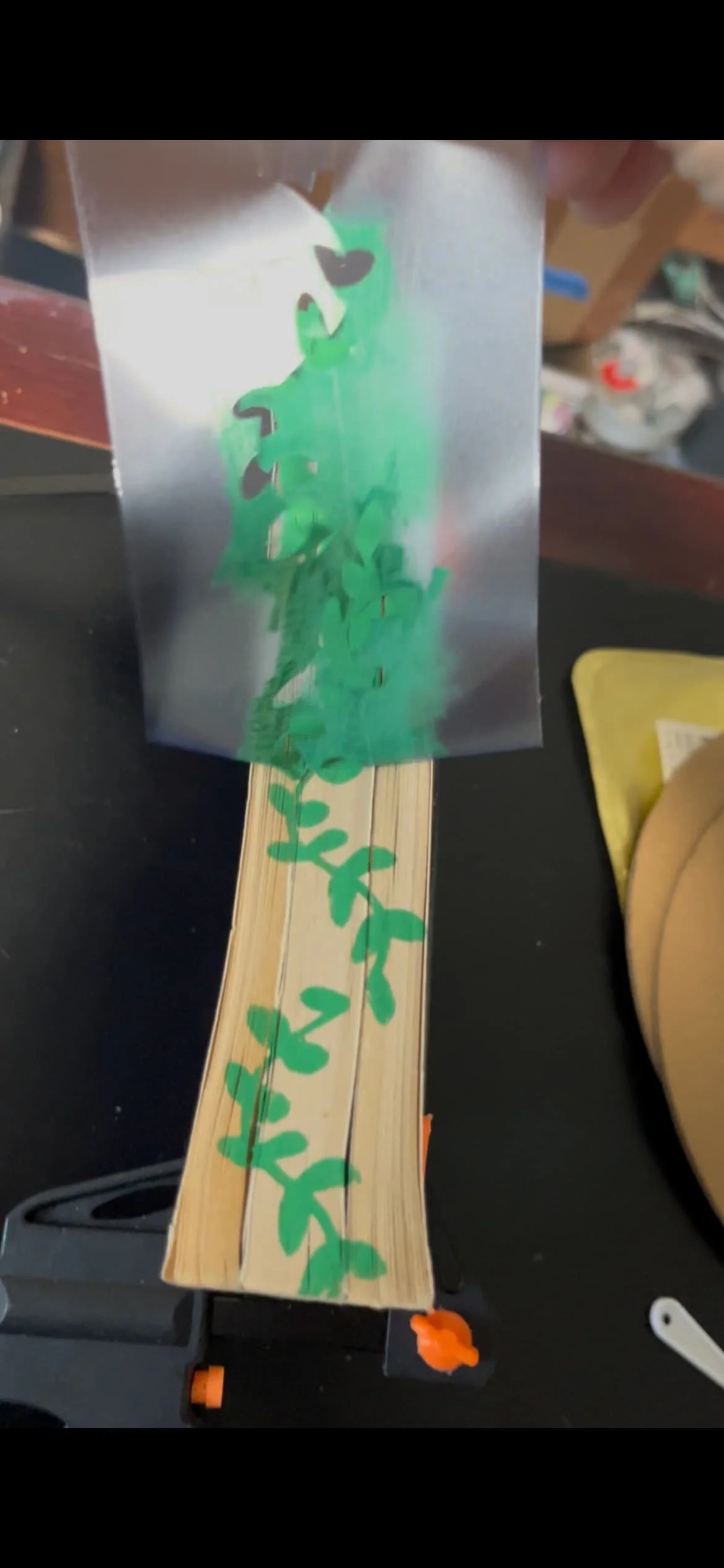 stenciled leaves on book page edges
