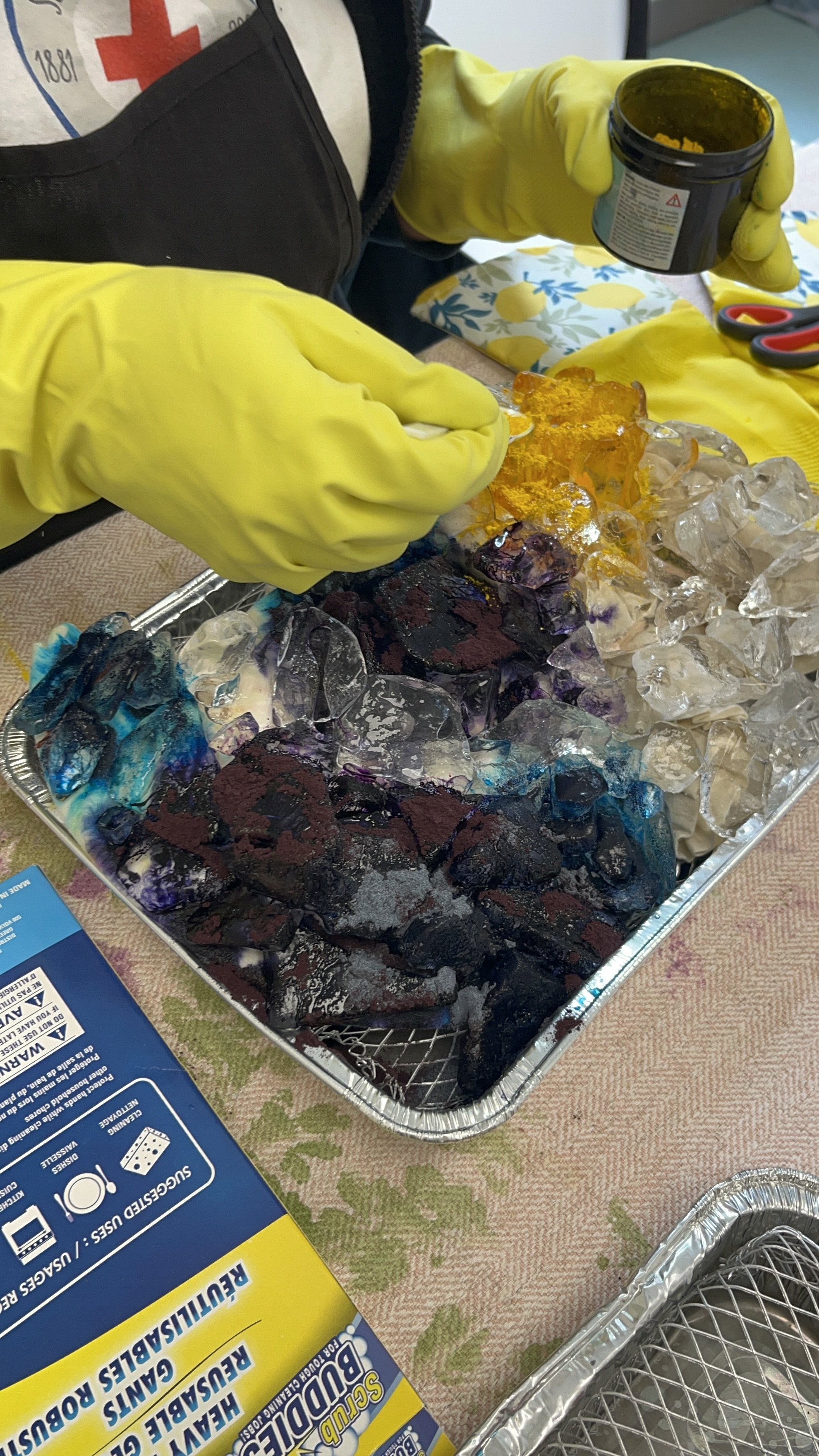 customer sprinkling powder dye on ice