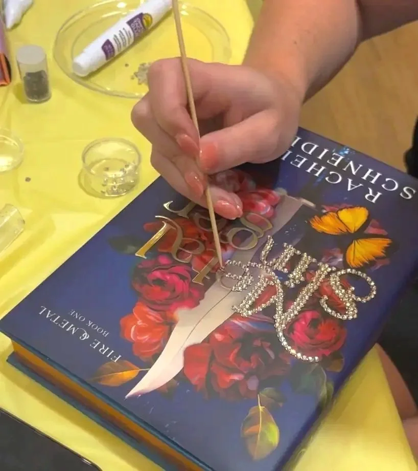 bedazzling a book the metal slinger