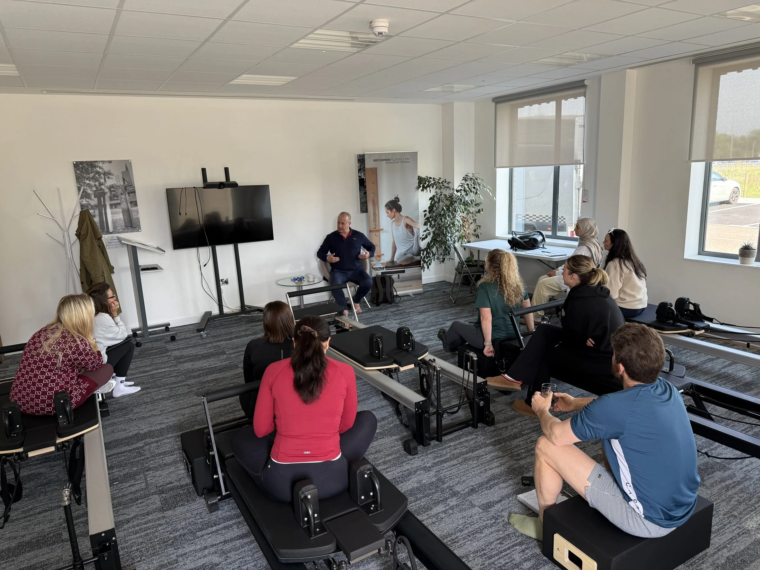 Watching the Next Generation of Reformer Pilates Instructors Take Shape
