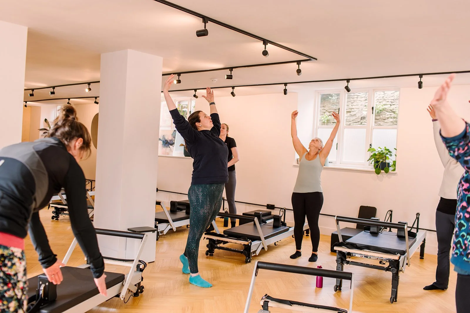 Pilates class at Nimble & Wild Pilates studio.