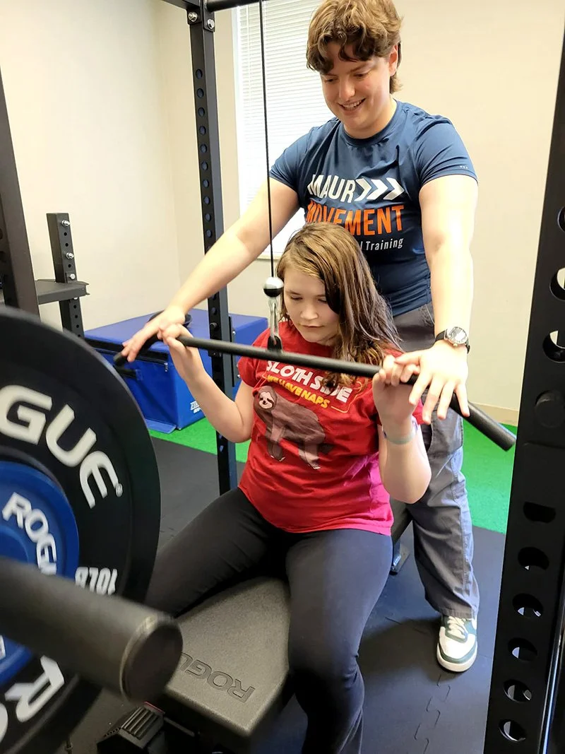 Inclusive Trainer working with student