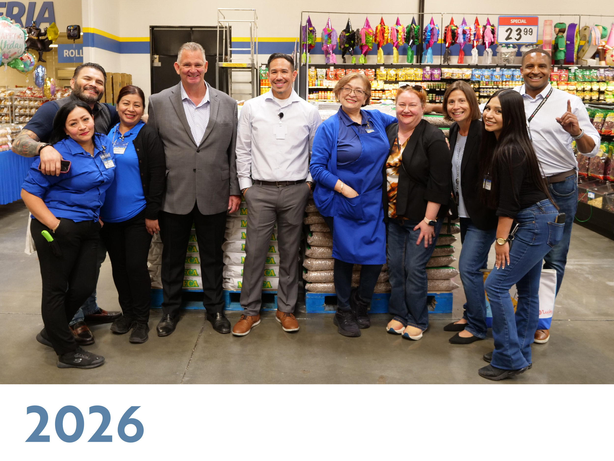 Jim Perkins with FoodMaxx store team members