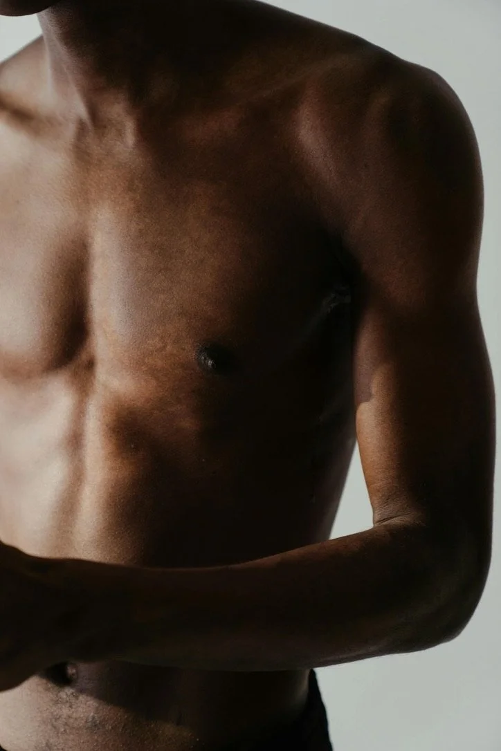 Flat, contoured male chest, gynecomastia surgery, male breast reduction in Denver at Amavi Aesthetic Surgery