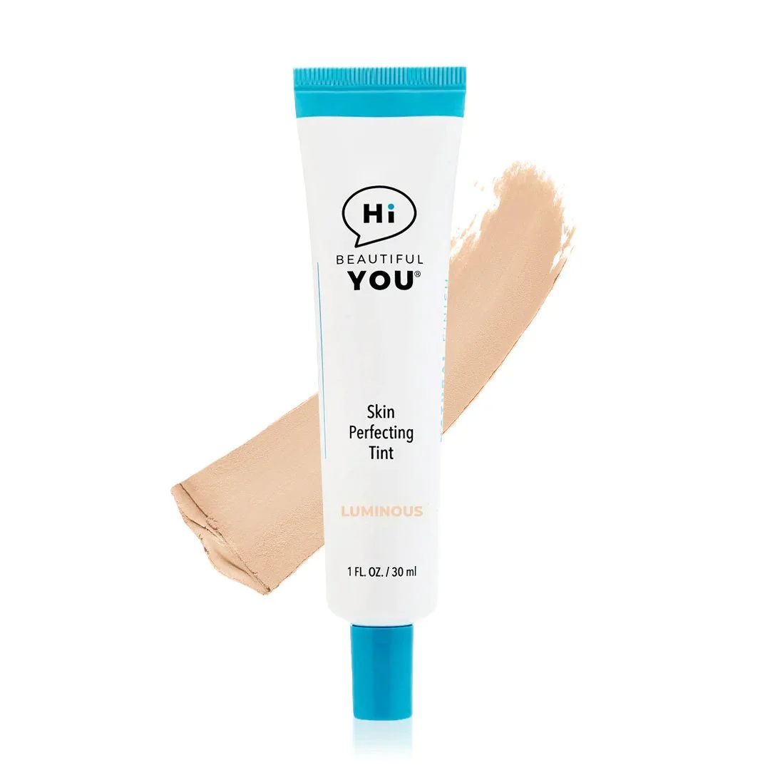 Hi Beautiful You Skin Perfecting Tint in Luminous shade with light peachy beige color swatch on white background