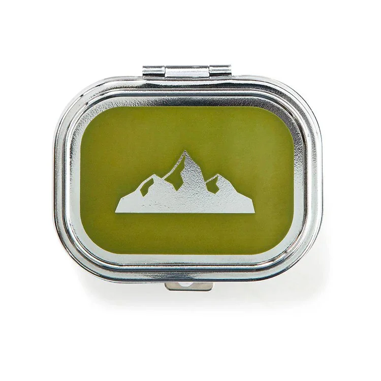 Closed silver pocket ashtray with olive green mountain graphic on lid, white background