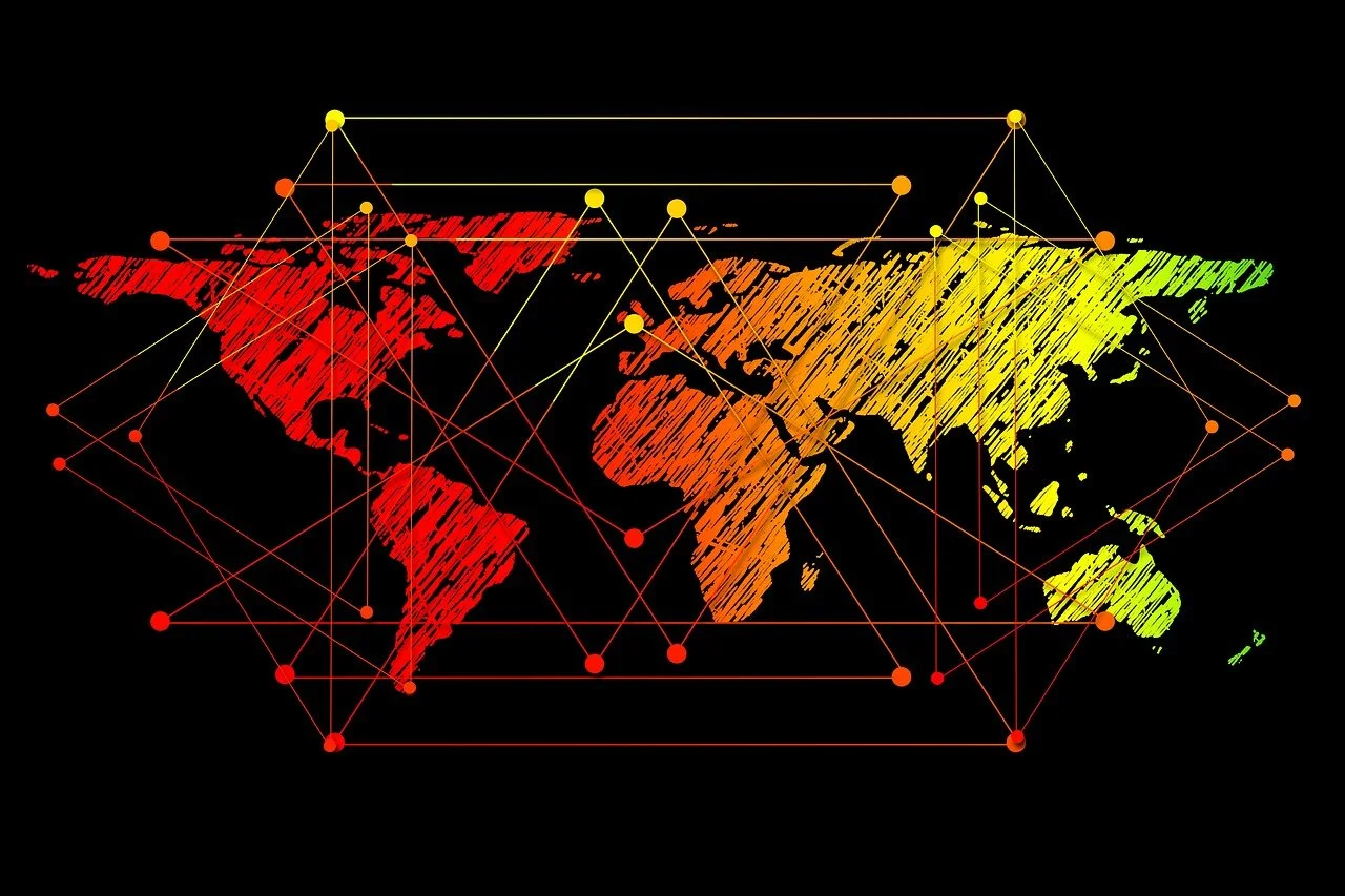 A world map with countries in shades of red, orange, and yellow, overlaid with a network of interconnected lines and dots in red, orange, and yellow.