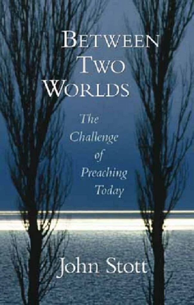 Book cover for 'Between Two Worlds: The Challenge of Preaching Today' by John Stott, featuring a background of a lake and leafless trees