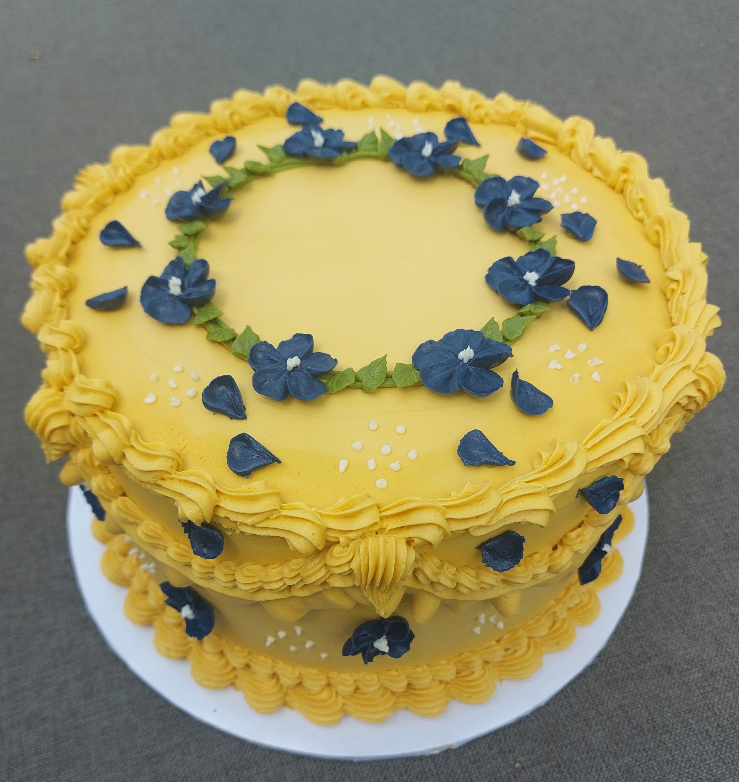 blue and gold graduation cake