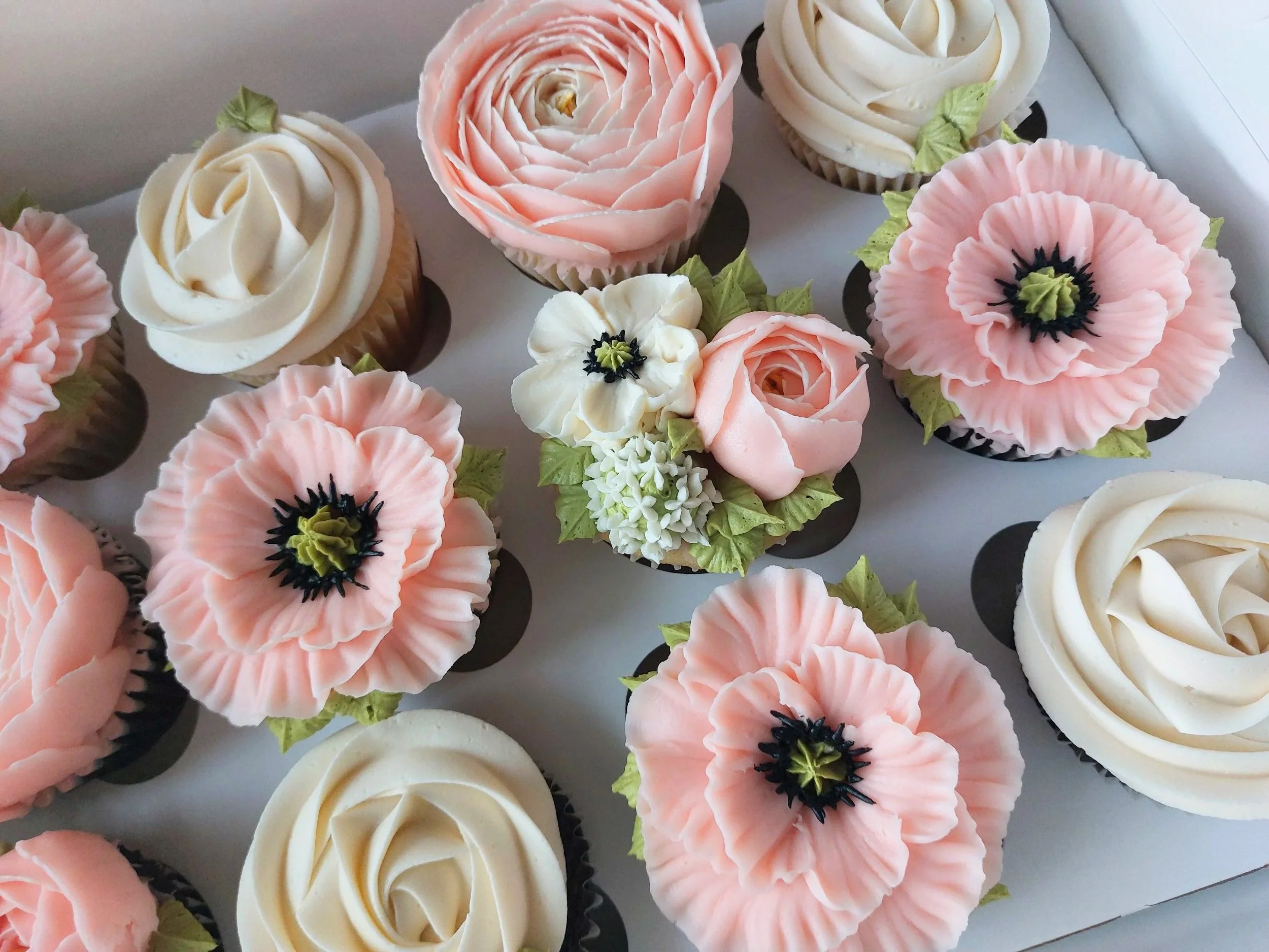 Delicate pink and cream cupcakes
