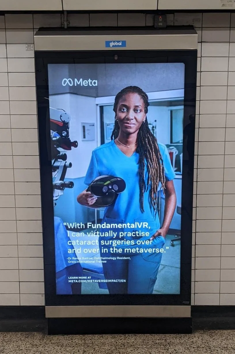 Orbis International x Meta ad on a digital screen in Charing Cross Station, London