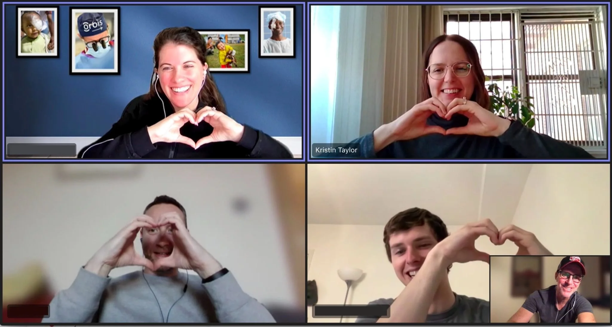 Kristin (top right) and four colleagues on a video call smiling and making heart shapes with their hands.