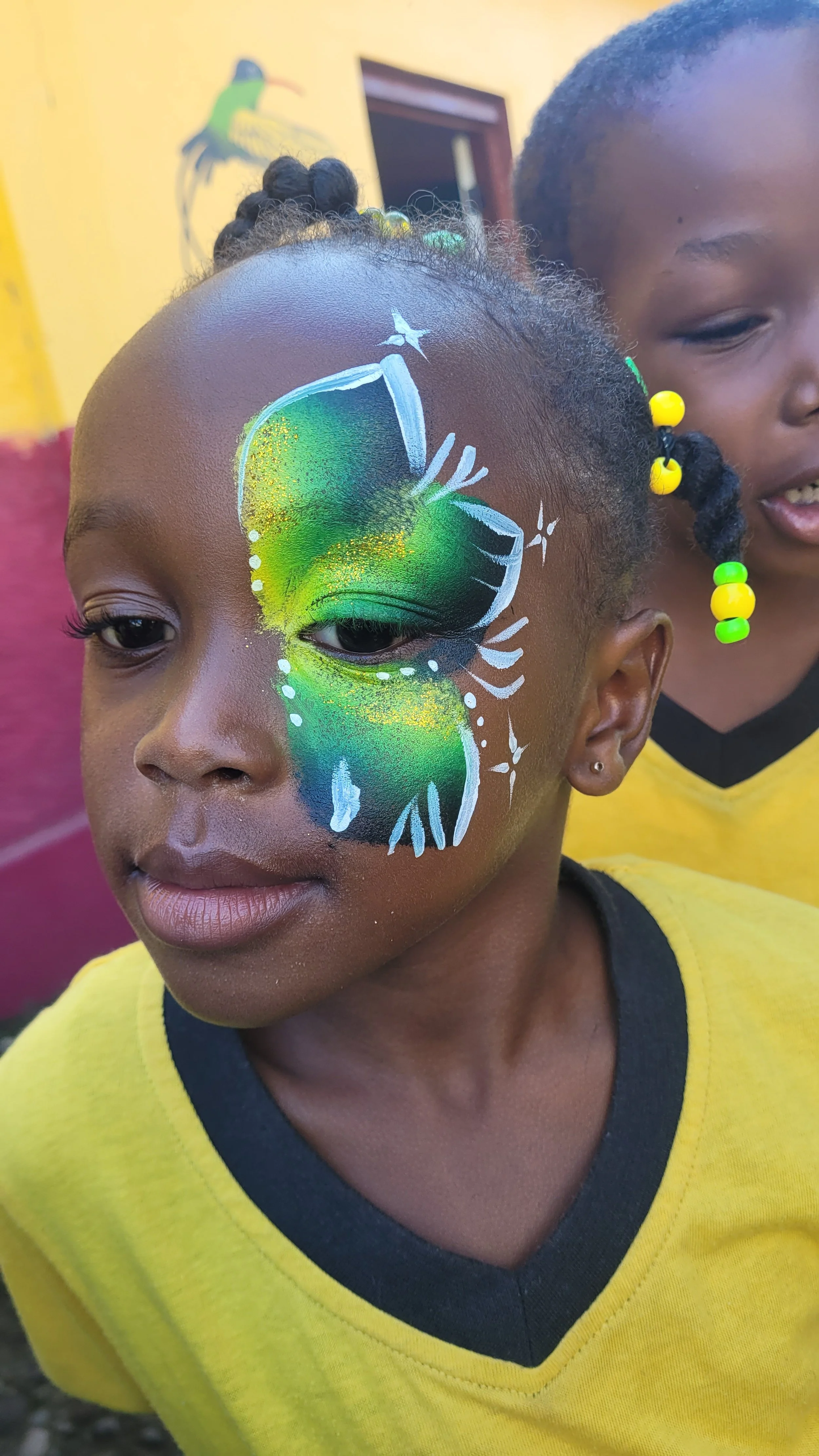 face painting @ PBS' jamaica day 2025