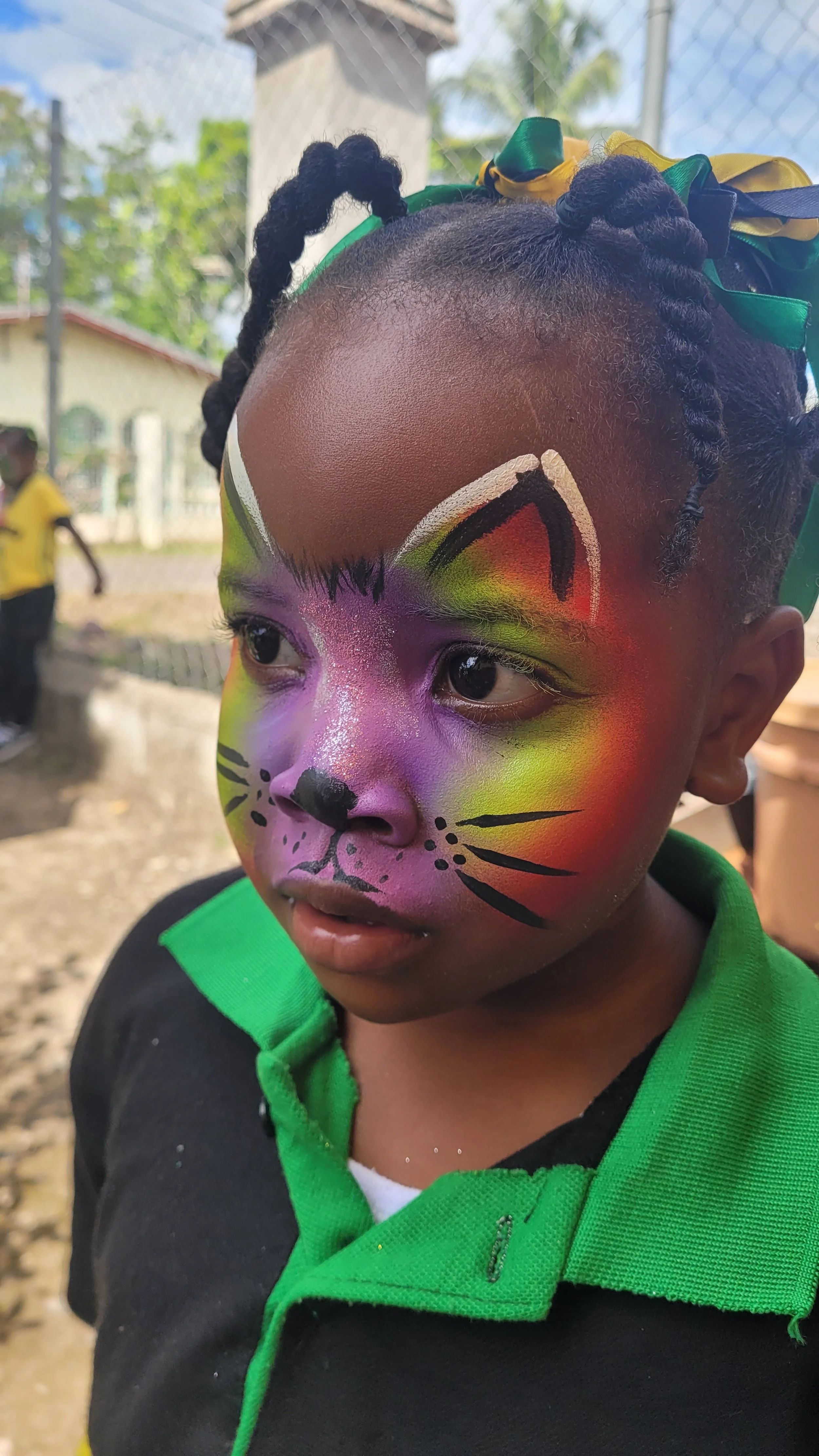 face painting @ PBS' jamaica day 2025