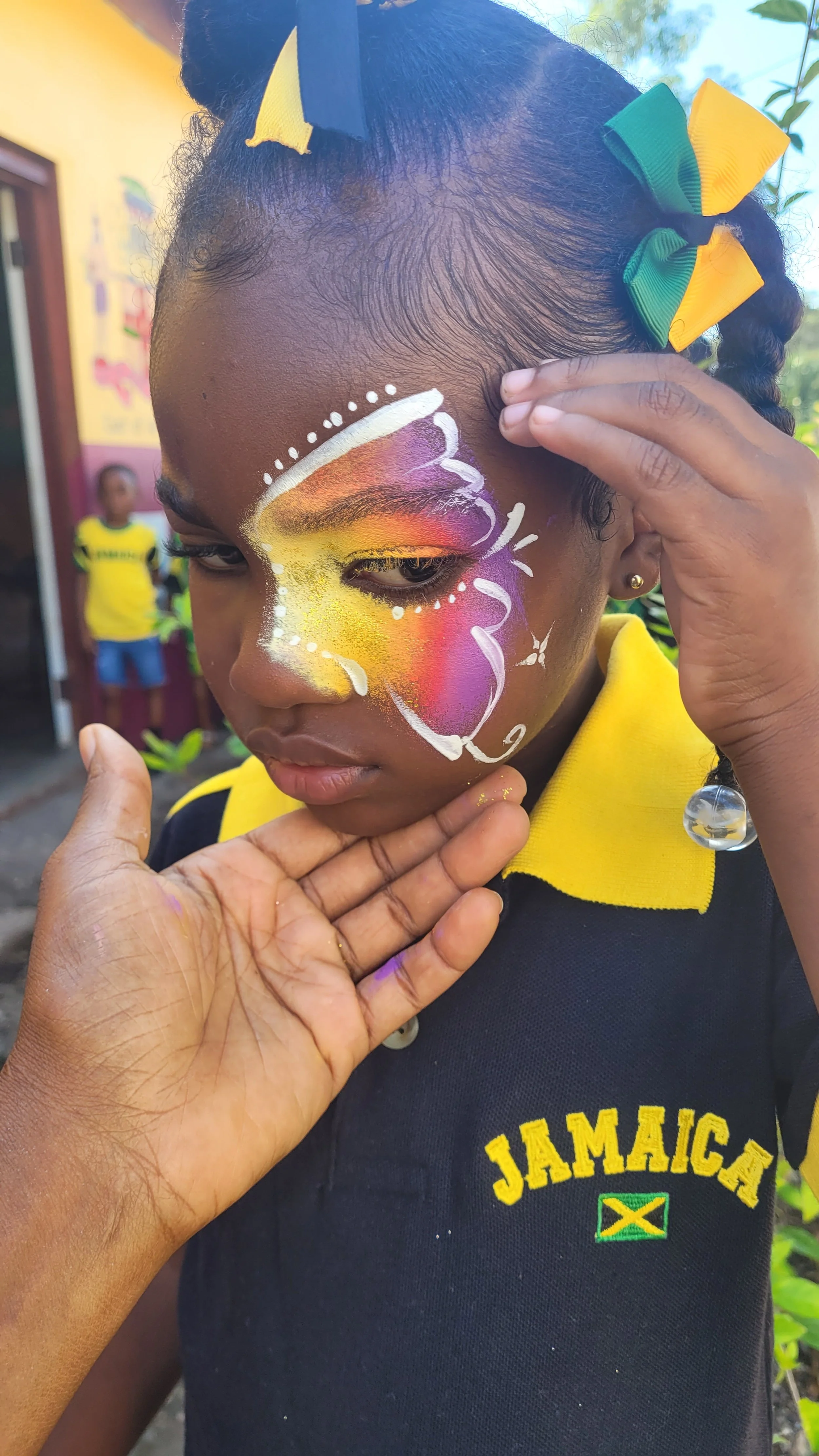face painting @ PBS' jamaica day 2025