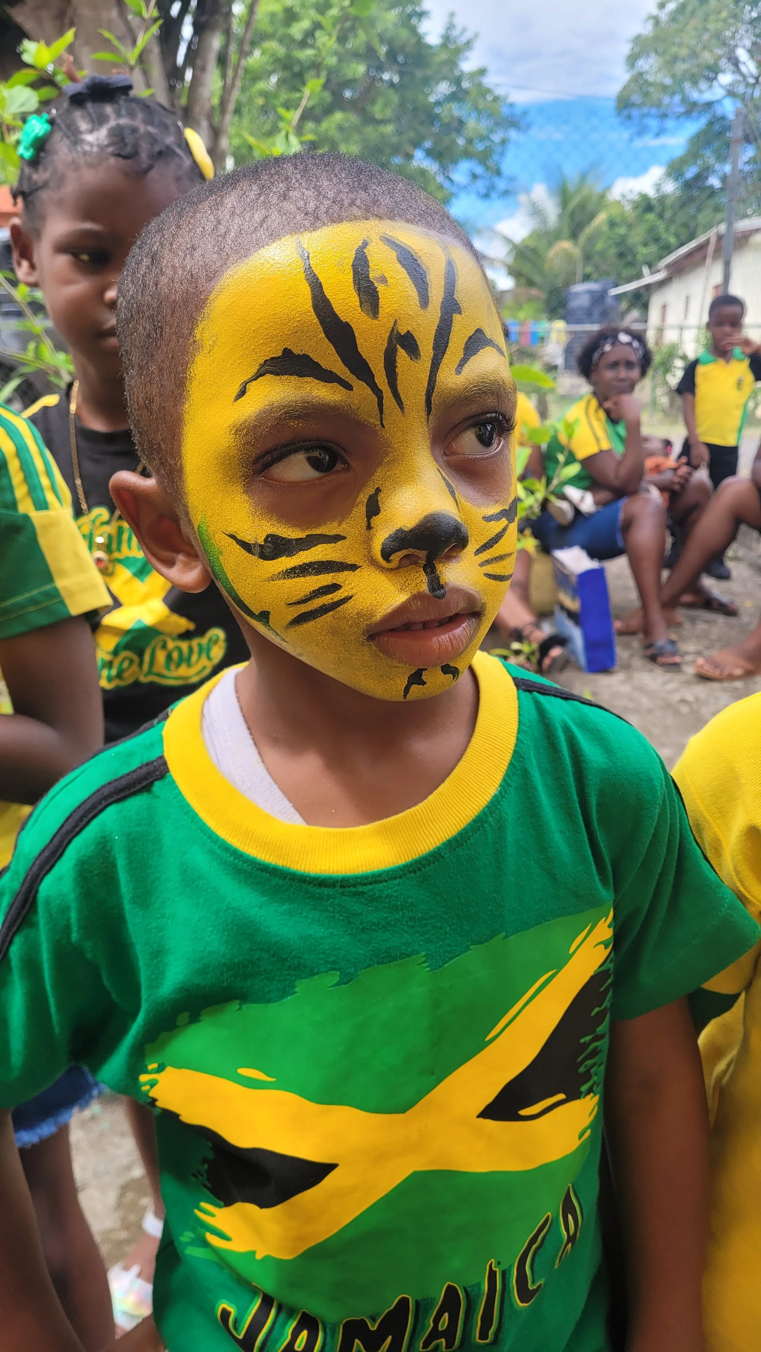 face painting @ PBS' jamaica day 2025