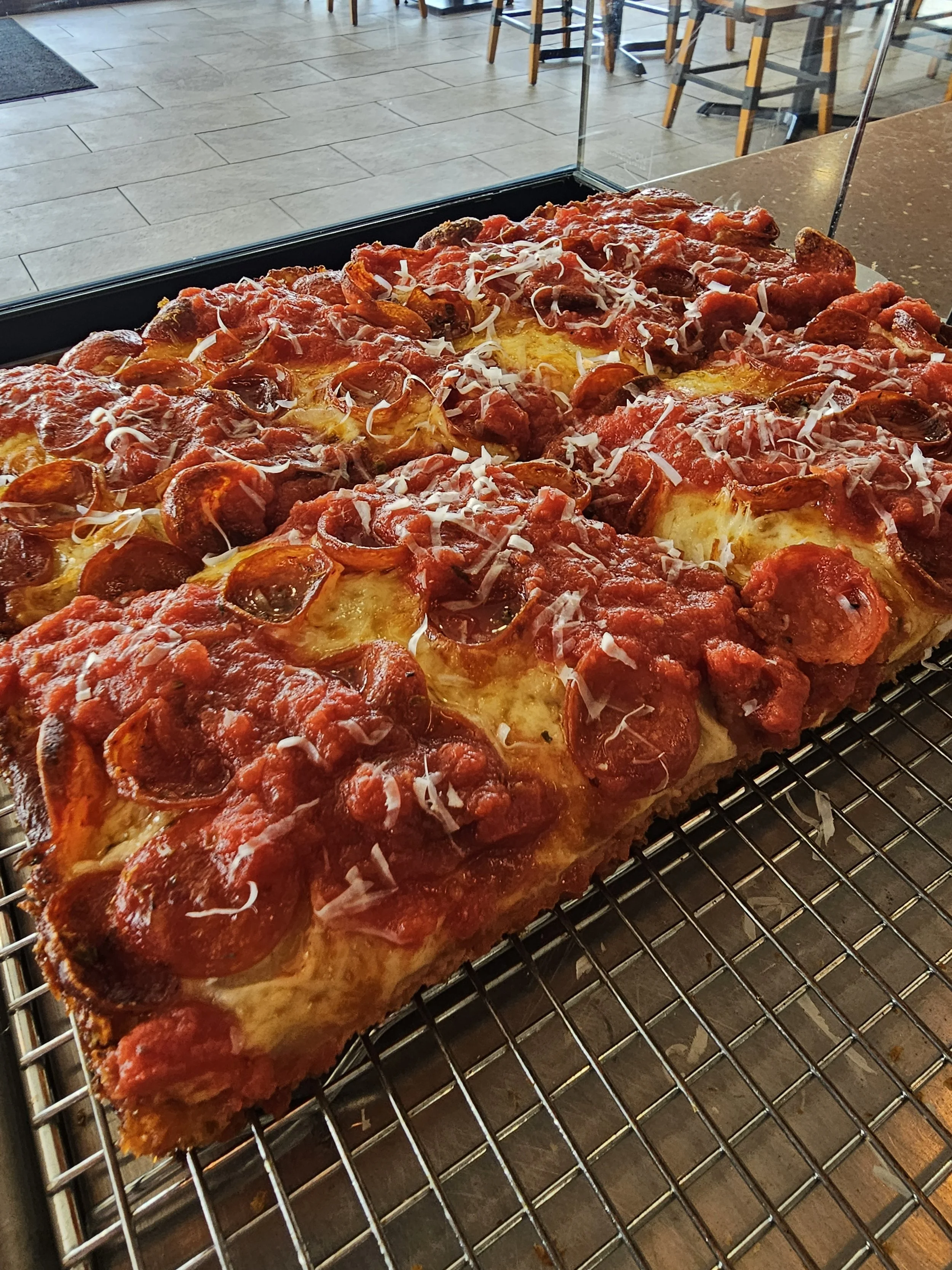 pepperoni detroit style pizza by the slice - cedar park, texas